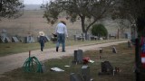 Guests arrive for the graveside service of Ricardo Rodriguez and his wife Therese Rodriguez on Nov. 11, 2017, in Sutherland Springs, Texas. (Credit: Scott Olson / Getty Images)
