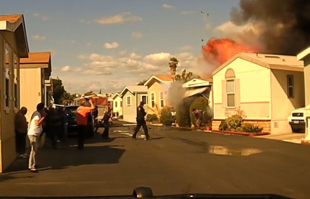 A mobile home in Cypress is seen exploding in a still from dashcam video released by the Cypress Police Department on March 15, 2018.