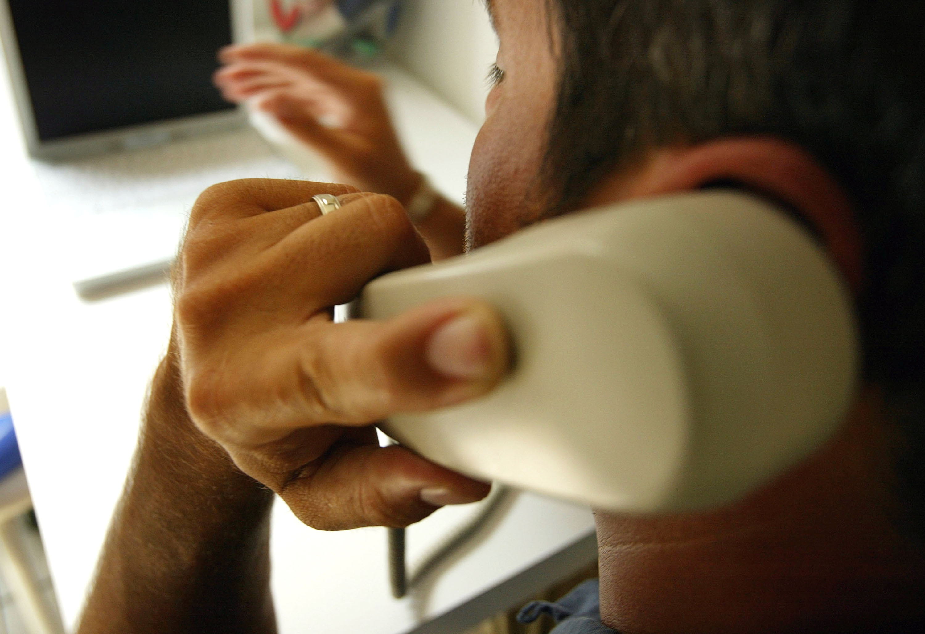 A man makes a phone call in this file photo. (Credit: Spencer Platt/Getty Images)