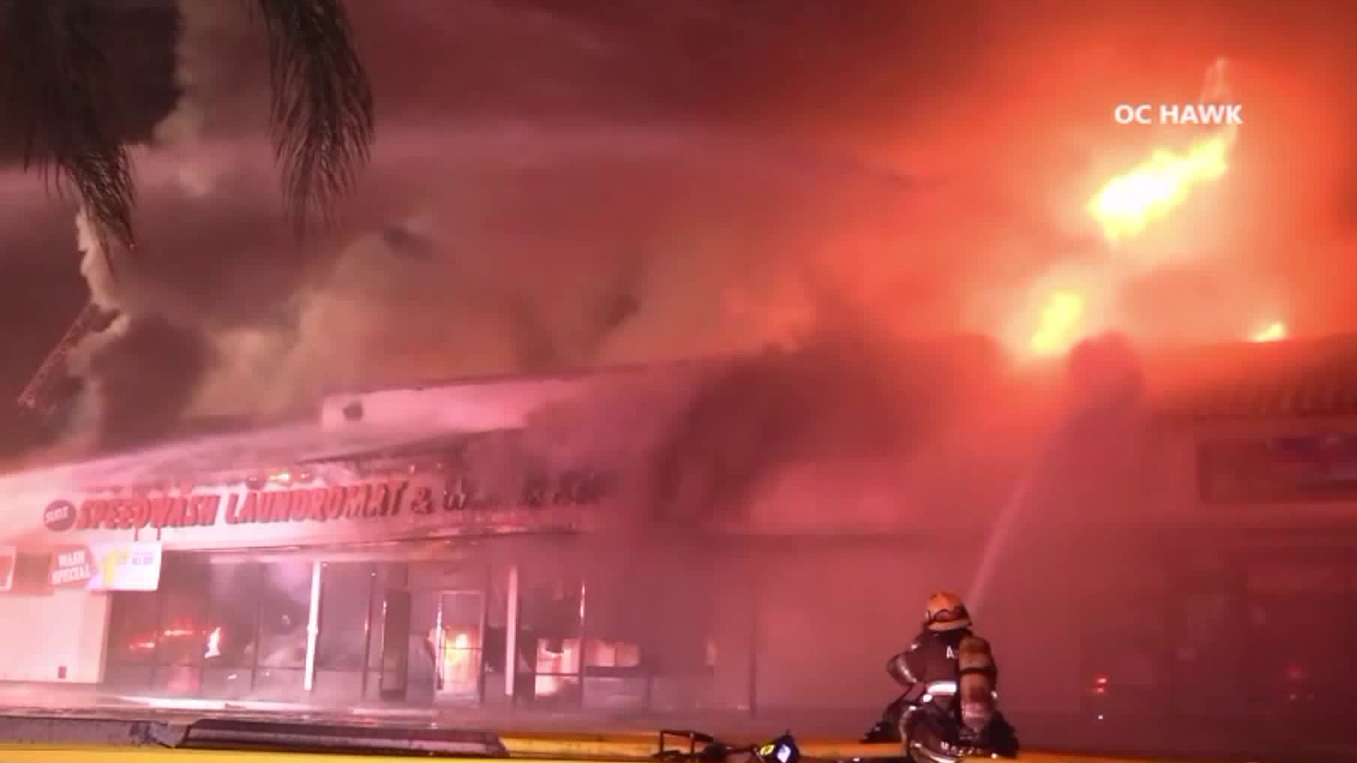 Crews battle a fire at a strip mall in Orange on Sept. 14, 2018. (Credit: OCHawk)