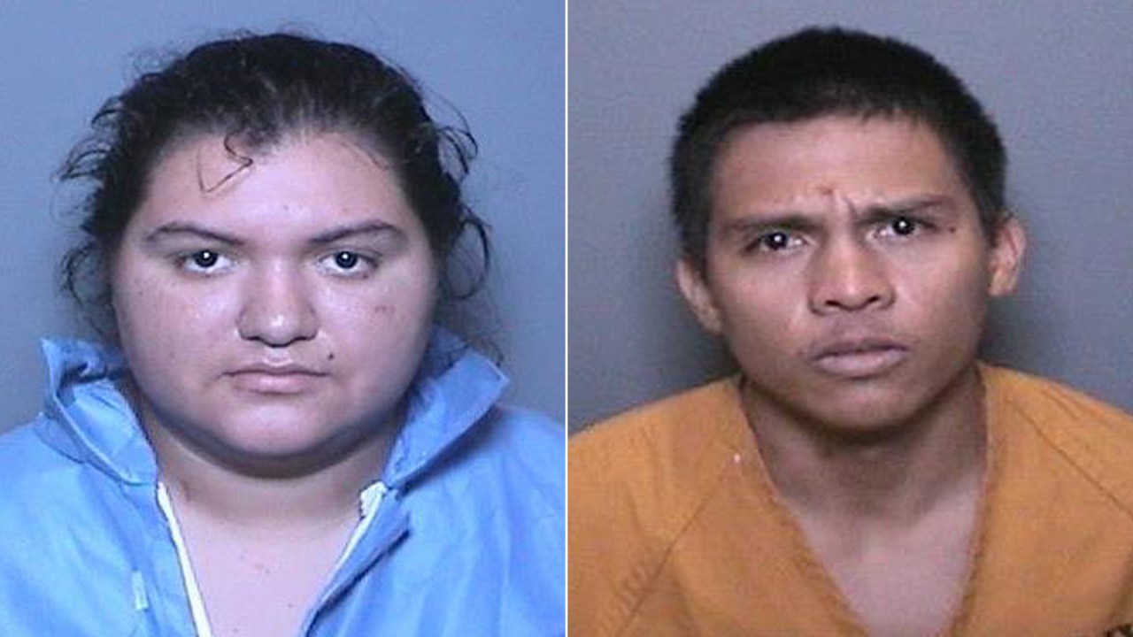 Xiomara Berrios, left, and Jose Andrade-Membreno are seen in booking photos released Oct. 2, 2018, by the Orange County Sheriff's Department.