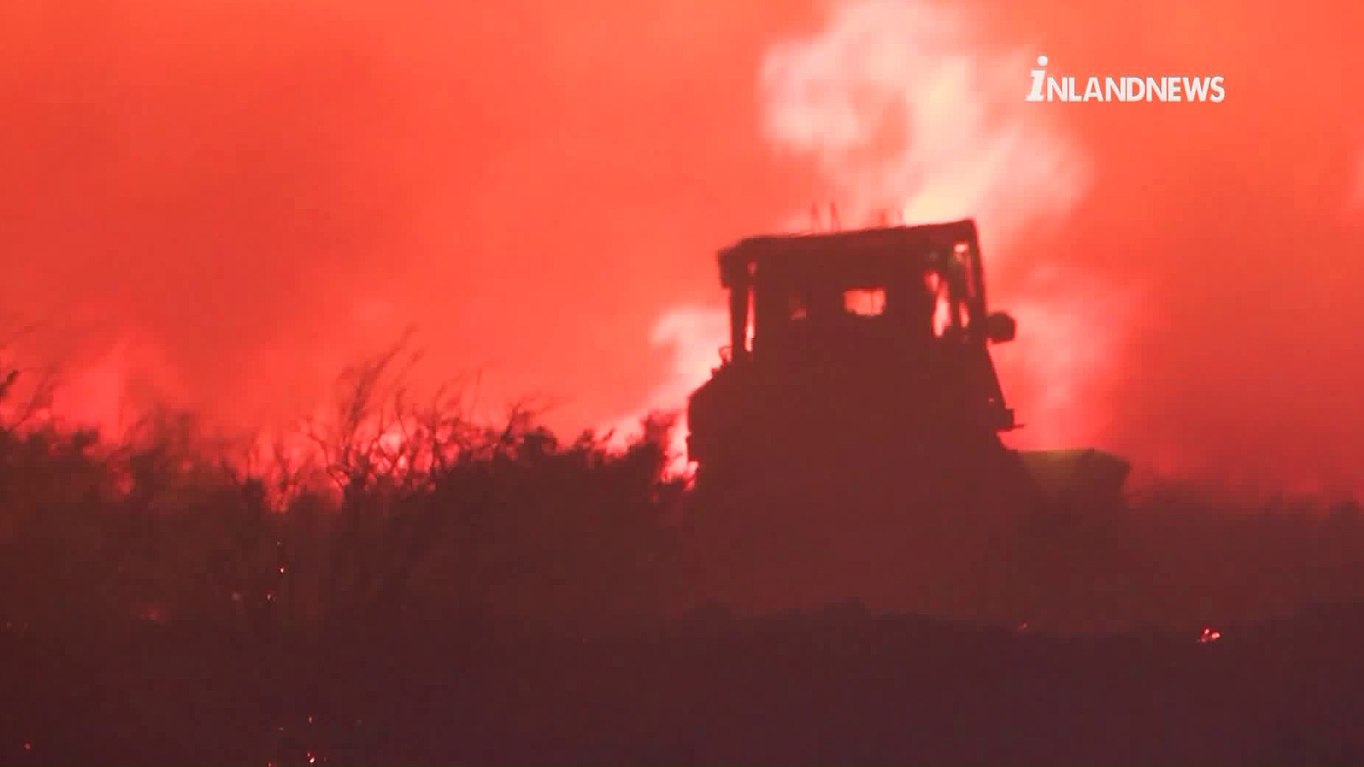 Fire burns as crews word to douse the Sierra Fire in Fontana, which broke out on Nov. 13, 2018. (Credit: Inland News)