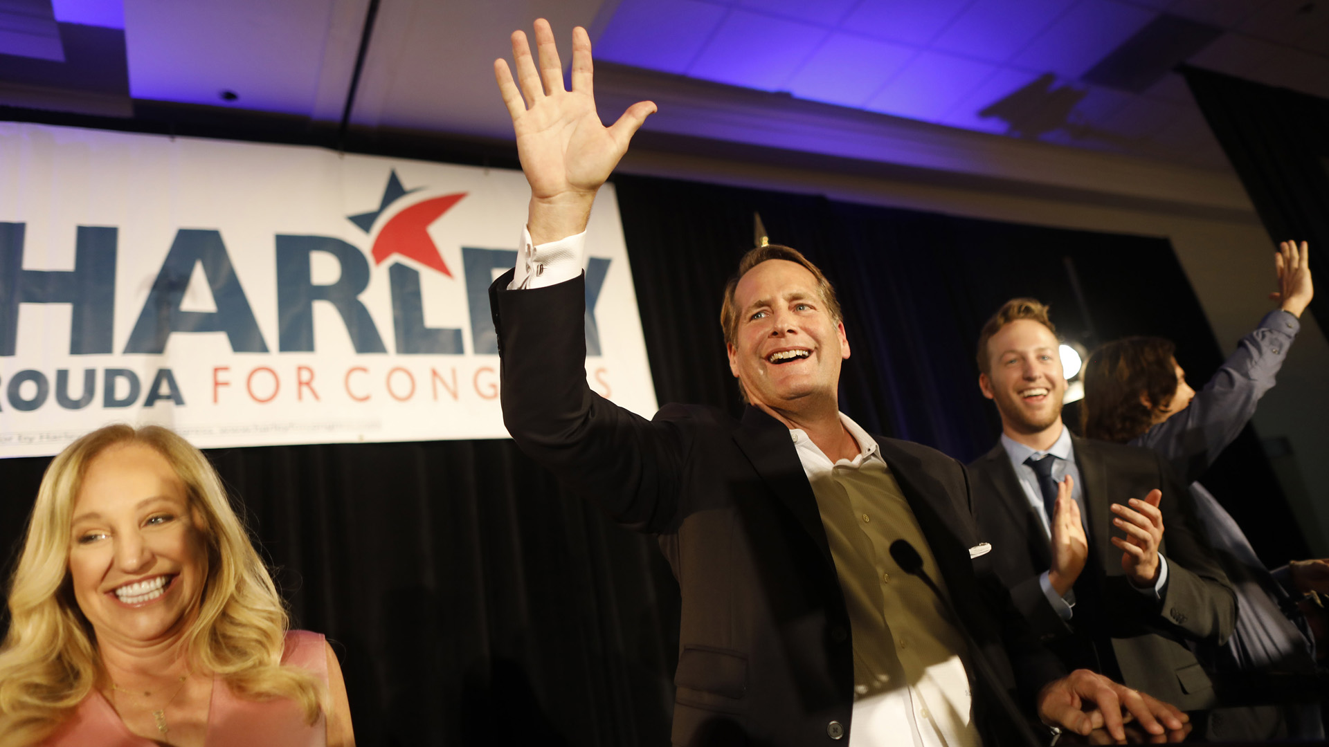 Harley Rouda speaks to supporters with his family during their election day party at the Newport Beach Marriott Hotel and Spa on Nov. 6, 2018, in Newport Beach, California. (Credit: Barbara Davidson/Getty Images)
