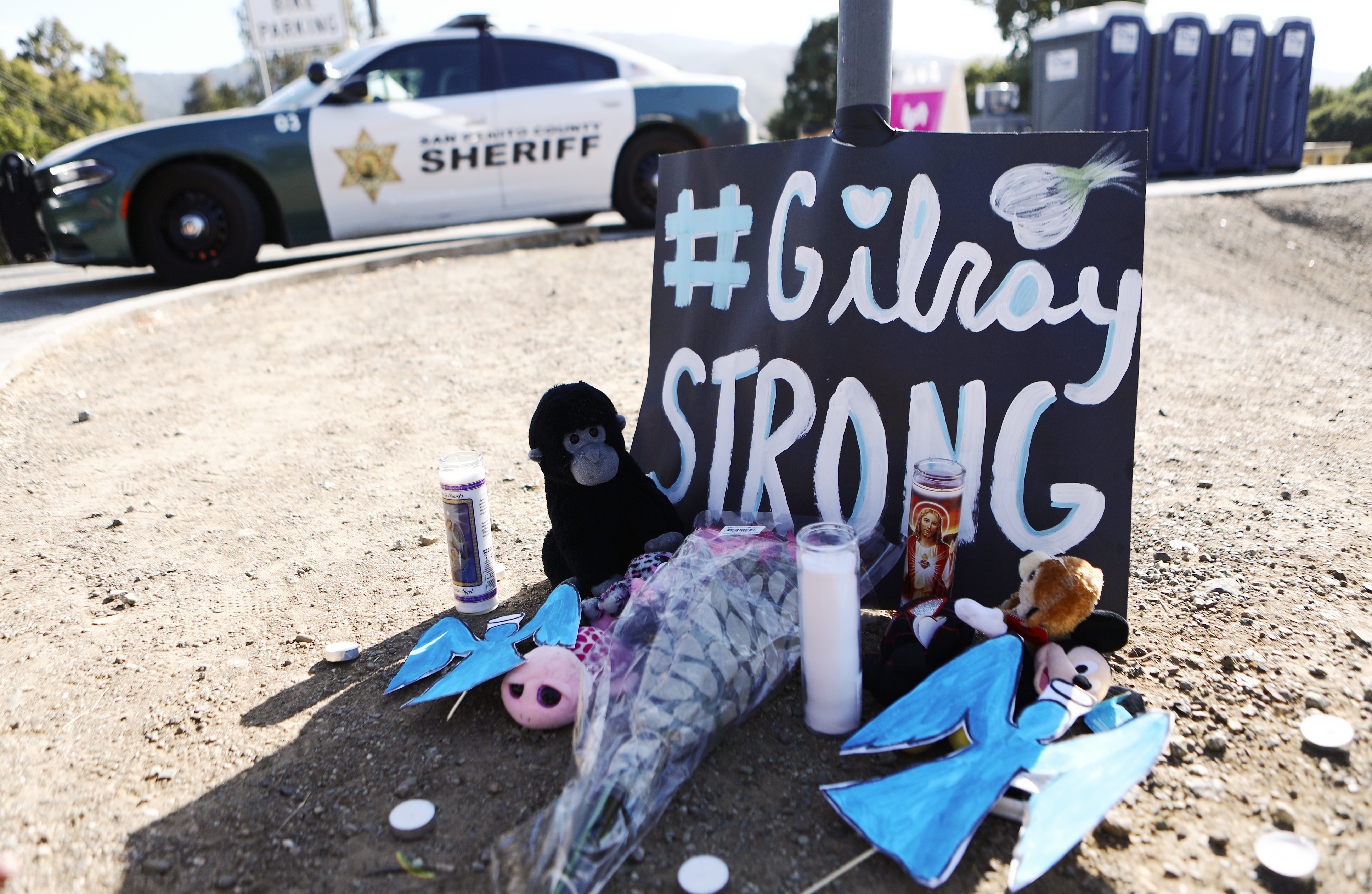 A makeshift memorial is seen outside the site of the Gilroy Garlic Festival, after a mass shooting took place at the event yesterday, on July 29, 2019 in Gilroy, California. Three victims were killed, two of them children, and at least a dozen were wounded before police officers killed the suspect. (Credit: Mario Tama/Getty Images)