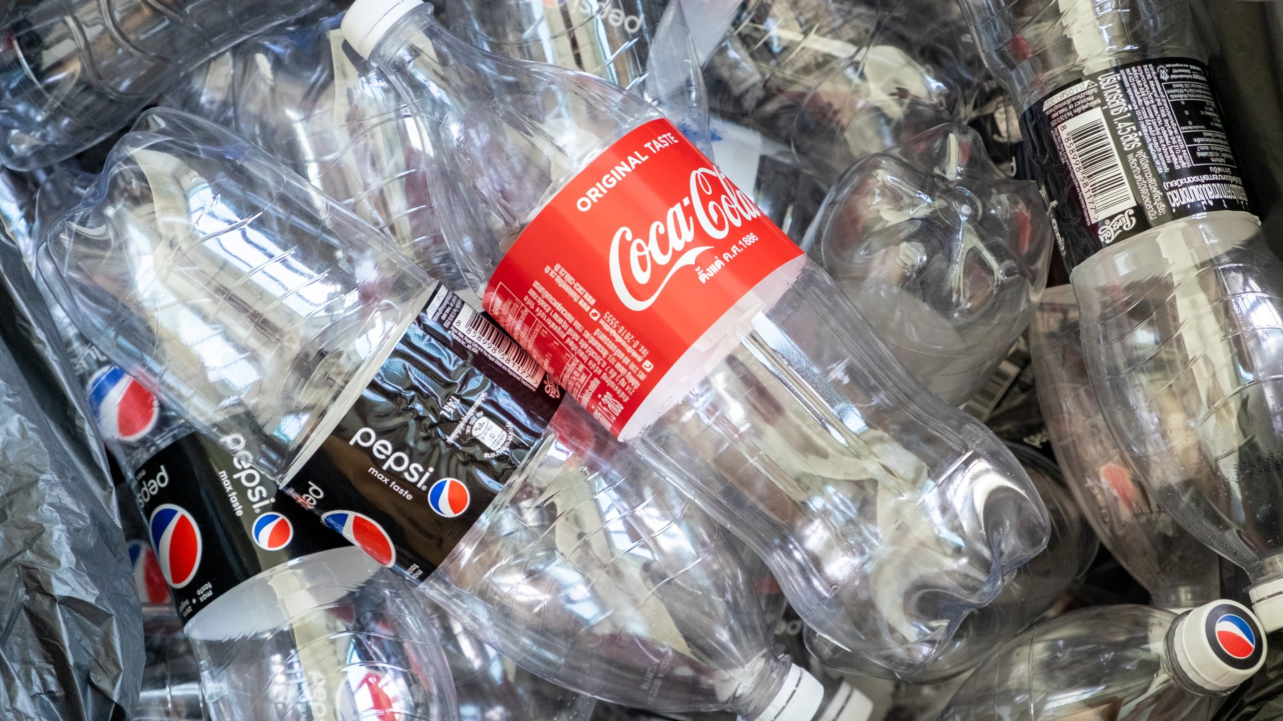 Empty plastic Coke and Pepsi bottles are seen in this undated photo obtained by CNN.