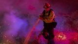 Firefighters control a backfire they set at the Maria Fire on Nov. 1, 2019. (Credit: David McNew/Getty Images)
