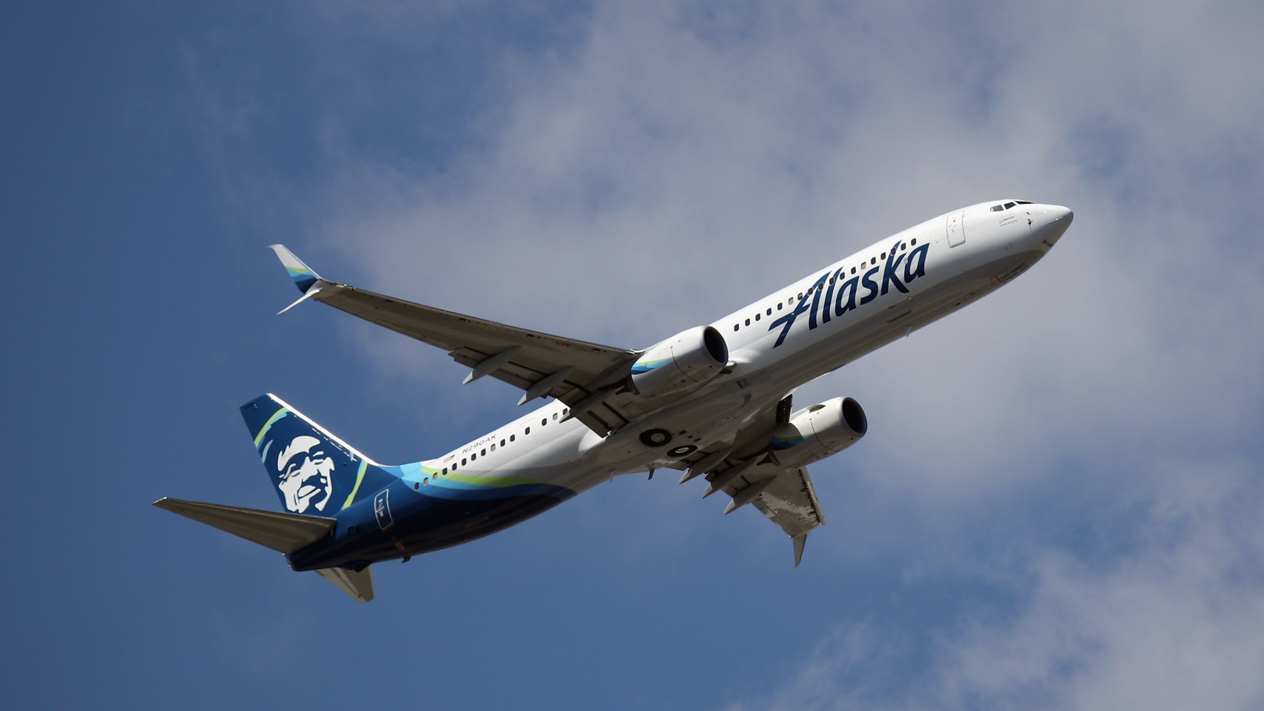 AN Alaska Airlines plane takes off from JFK Airport on Aug. 24, 2019. (Credit: Bruce Bennett/Getty Images)