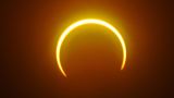 The moon moves in front of the sun in a rare "ring of fire" solar eclipse as seen from Balut Island, Saraggani province in the southern island of Mindanao on Dec. 26, 2019. (Credit: FERDINANDH CABRERA/AFP via Getty Images)