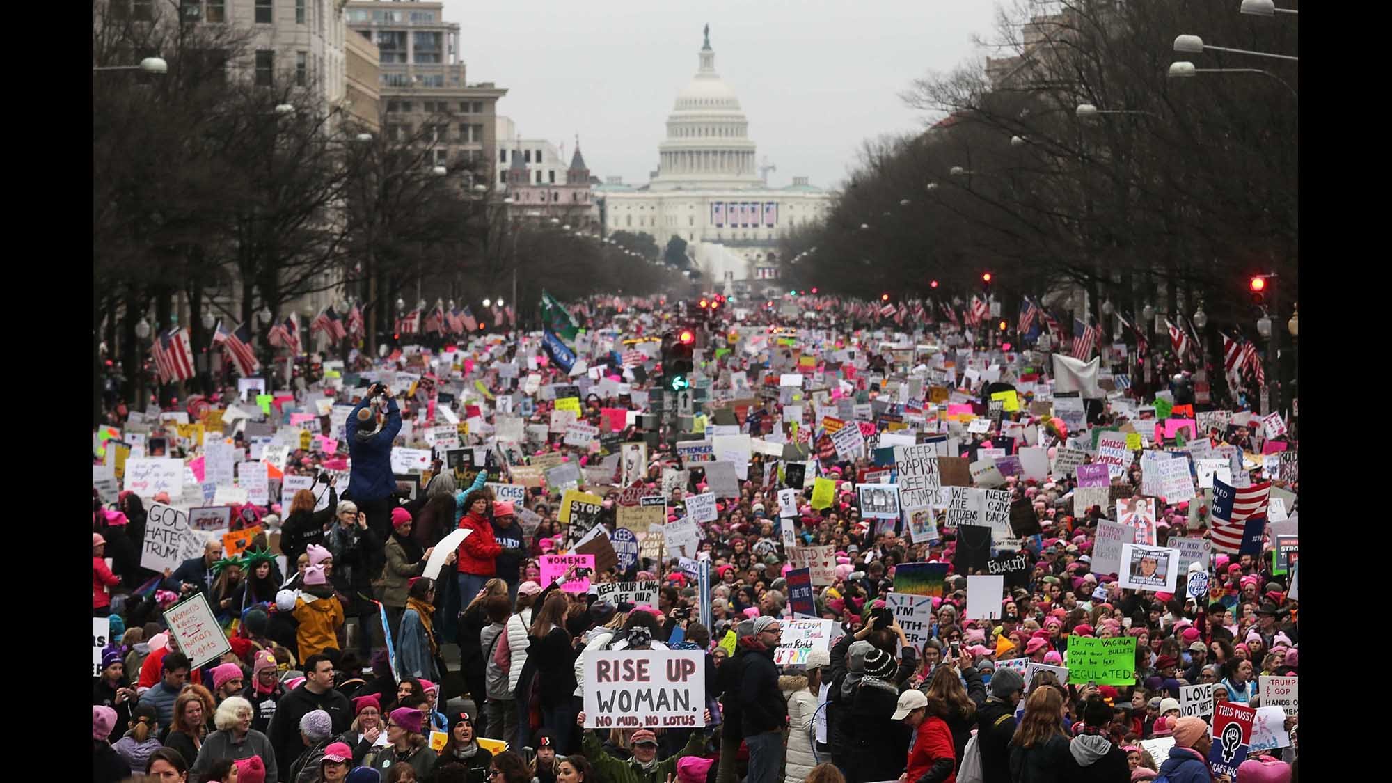 Protesters at the Women's March walk down Pennsylvania Avenue in Washington, D.C., on Jan. 21, 2017. (Credit: Mario Tama/Getty Images via CNN)