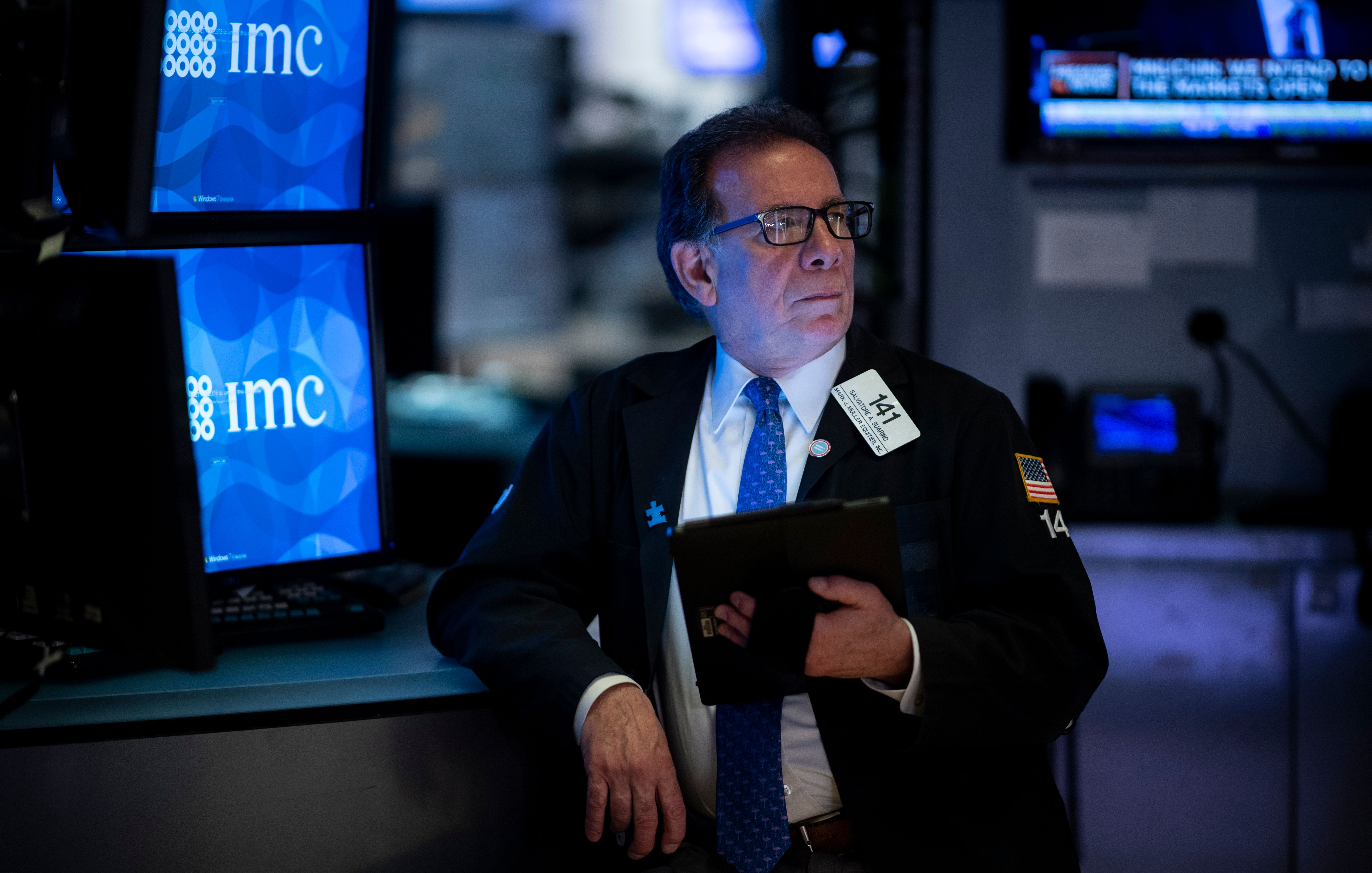Traders work during the opening bell at the New York Stock Exchange on March 13, 2020, at Wall Street in New York City. (Johannes Eisele/AFP via Getty Images)