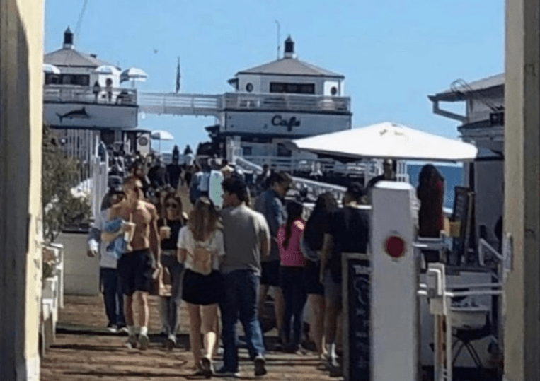 This photo, posted by Instagram user @samidenicola, shows a crowd on the Malibu Pier on March 21, 2020.