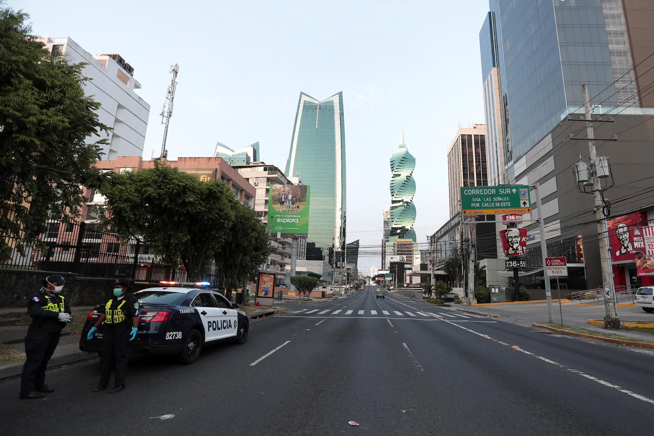 Police officers are pictured during the curfew as the coronavirus disease (COVID-19) outbreak continues, in Panama City, Panama March 31, 2020. (Erick Marciscano/Reuters)
