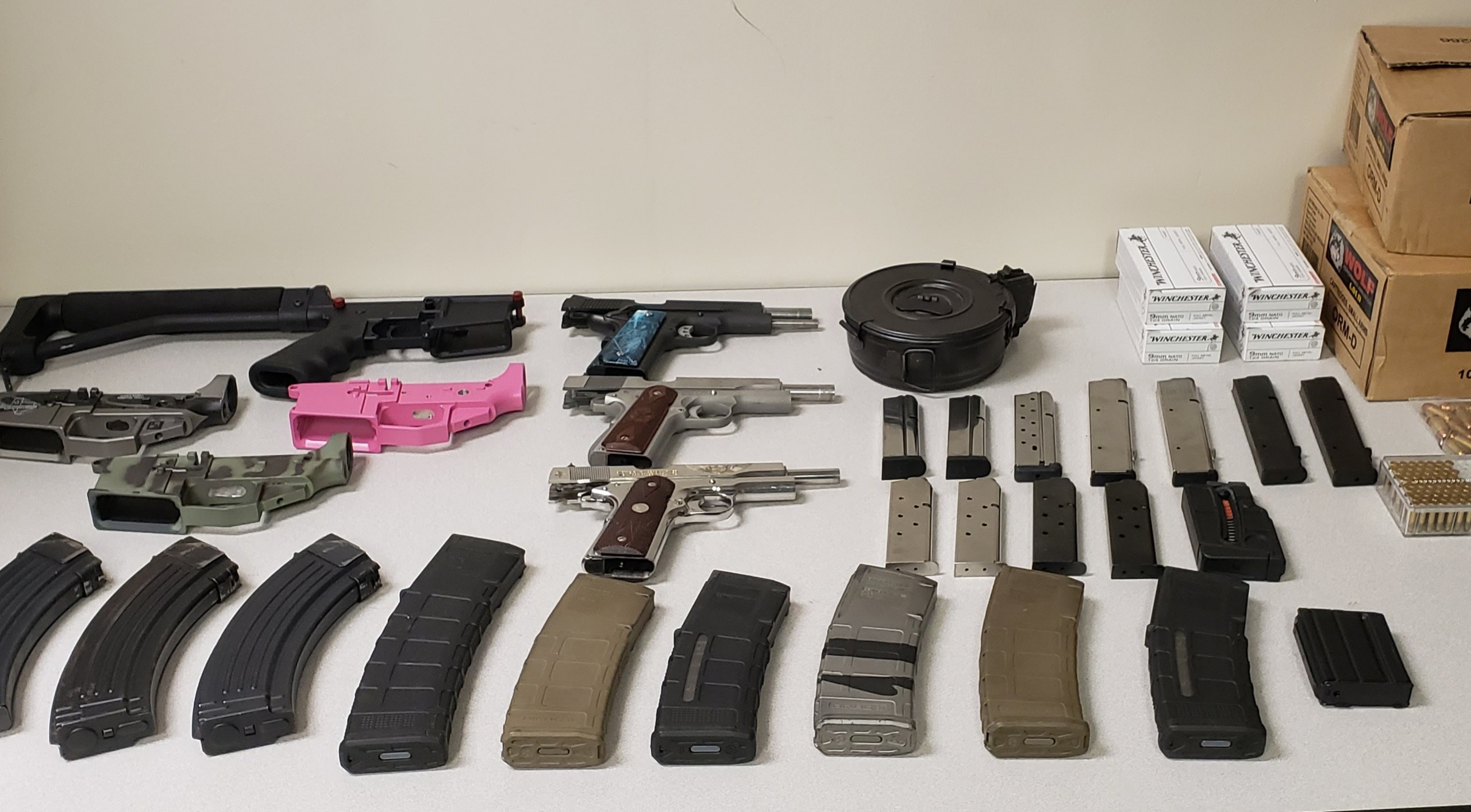 The California Attorney General's Office released this photo of firearms and ammunition seized from Rene Navas of Lancaster on May 11, 2020.