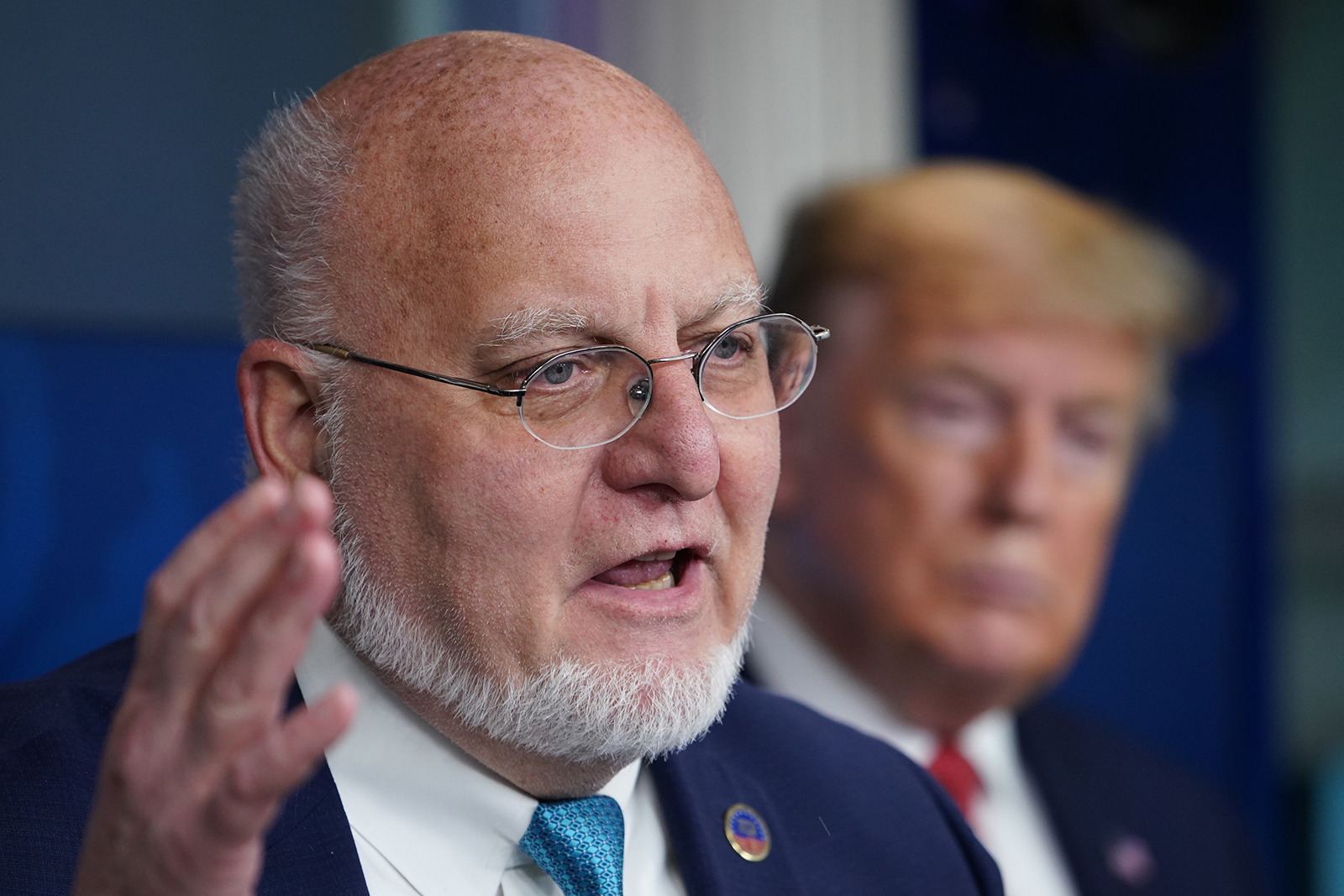 CDC Director Robert R. Redfield speaks as Donald Trump listens during the daily briefing on the novel coronavirus at the White House on April 16, 2020, in Washington, DC. (MANDEL NGAN/AFP via Getty Images)