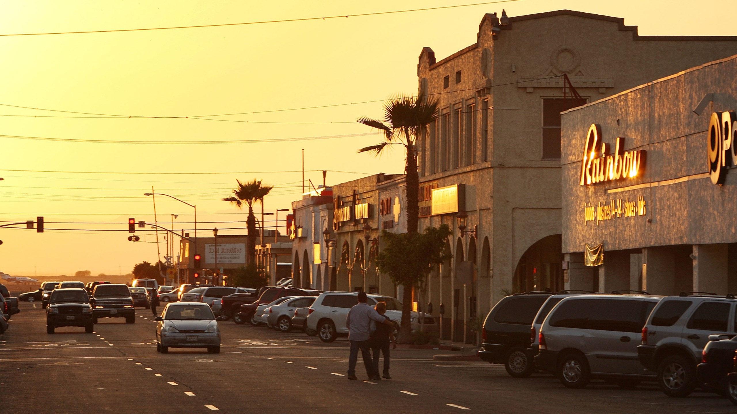 The sun sets in the border town of Calexico, near El Centro in Imperial County on March 12, 2009. (David McNew/Getty Images)