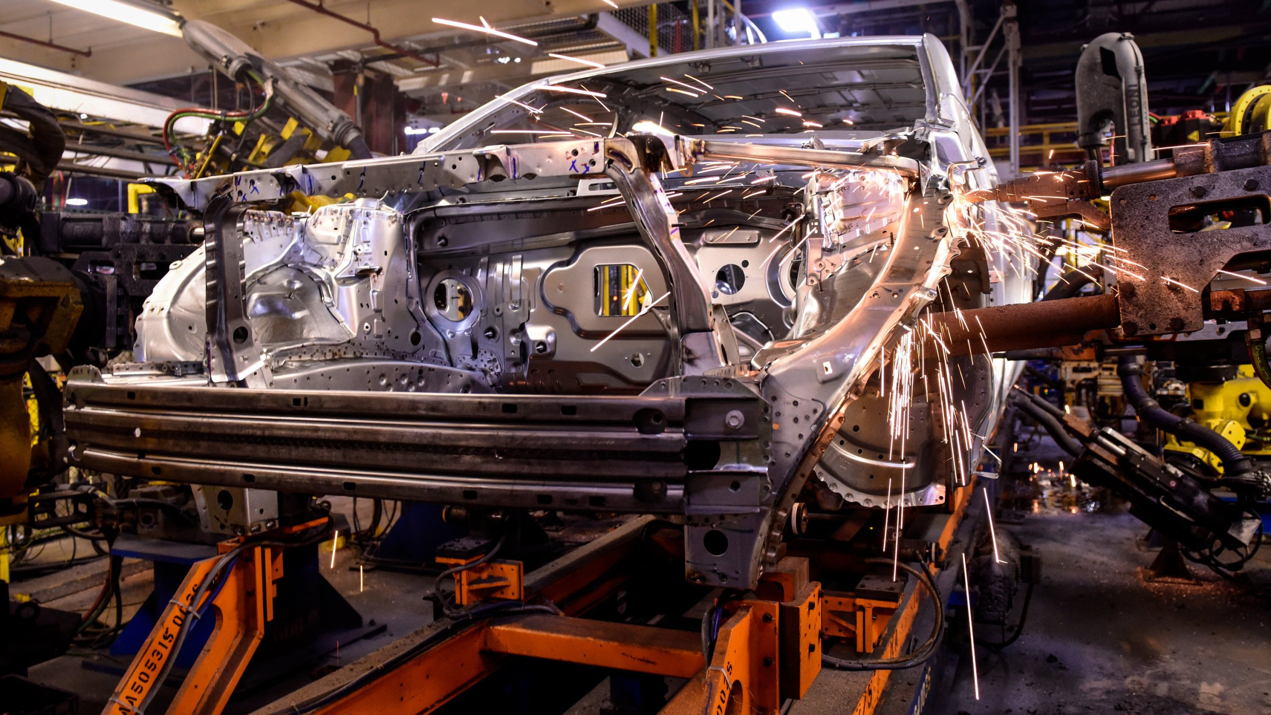 General Motors workers on the line Thursday, December 8, 2016 at the General Motors Spring Hill Manufacturing plant in Spring Hill, TN. (Sanford Myers for General Motors)