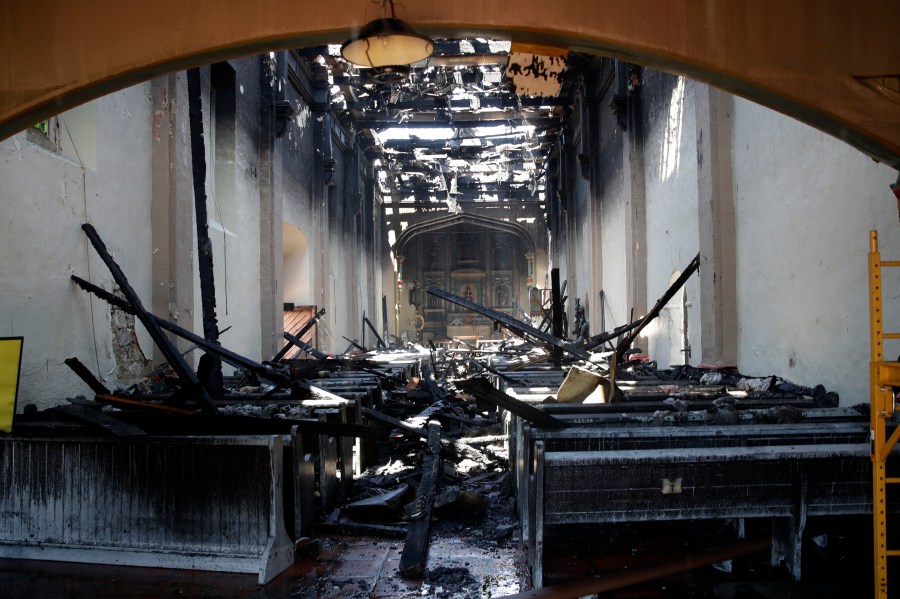 The interior of the San Gabriel Mission is damaged following a morning fire, Saturday, July 11, 2020, in San Gabriel. (AP Photo/Marcio Jose Sanchez)