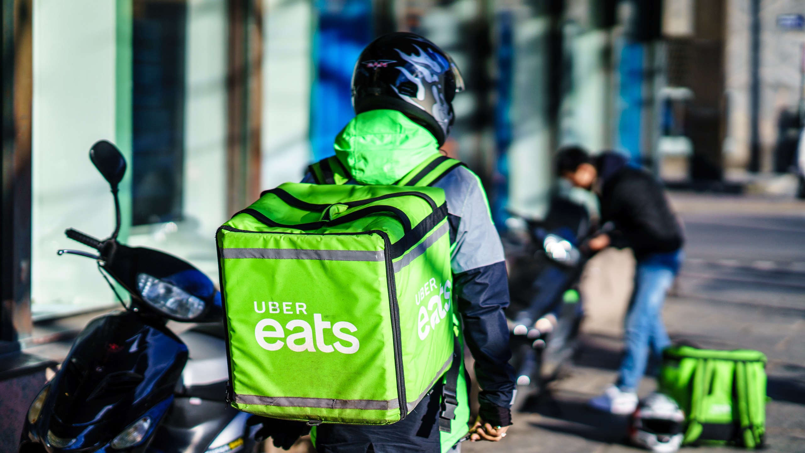Less than a month after Uber tried and failed to buy GrubHub, the ride-hailing company has won a different deal to bolster its food delivery business. (Shutterstock via CNN Wire)