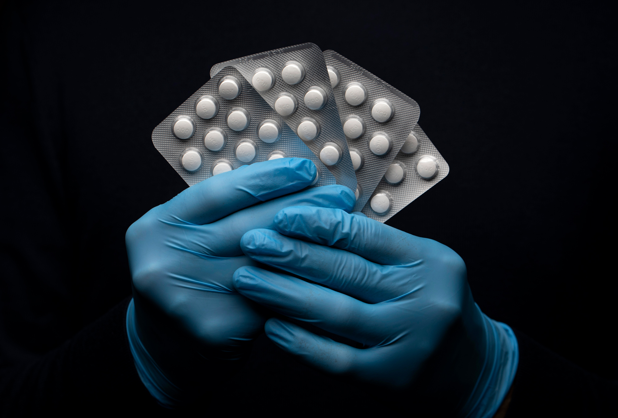In this photo illustration a pack of Hydroxychloroquine Sulfate medication is held up on March 26, 2020 in London, United Kingdom. (John Phillips/Getty Images)