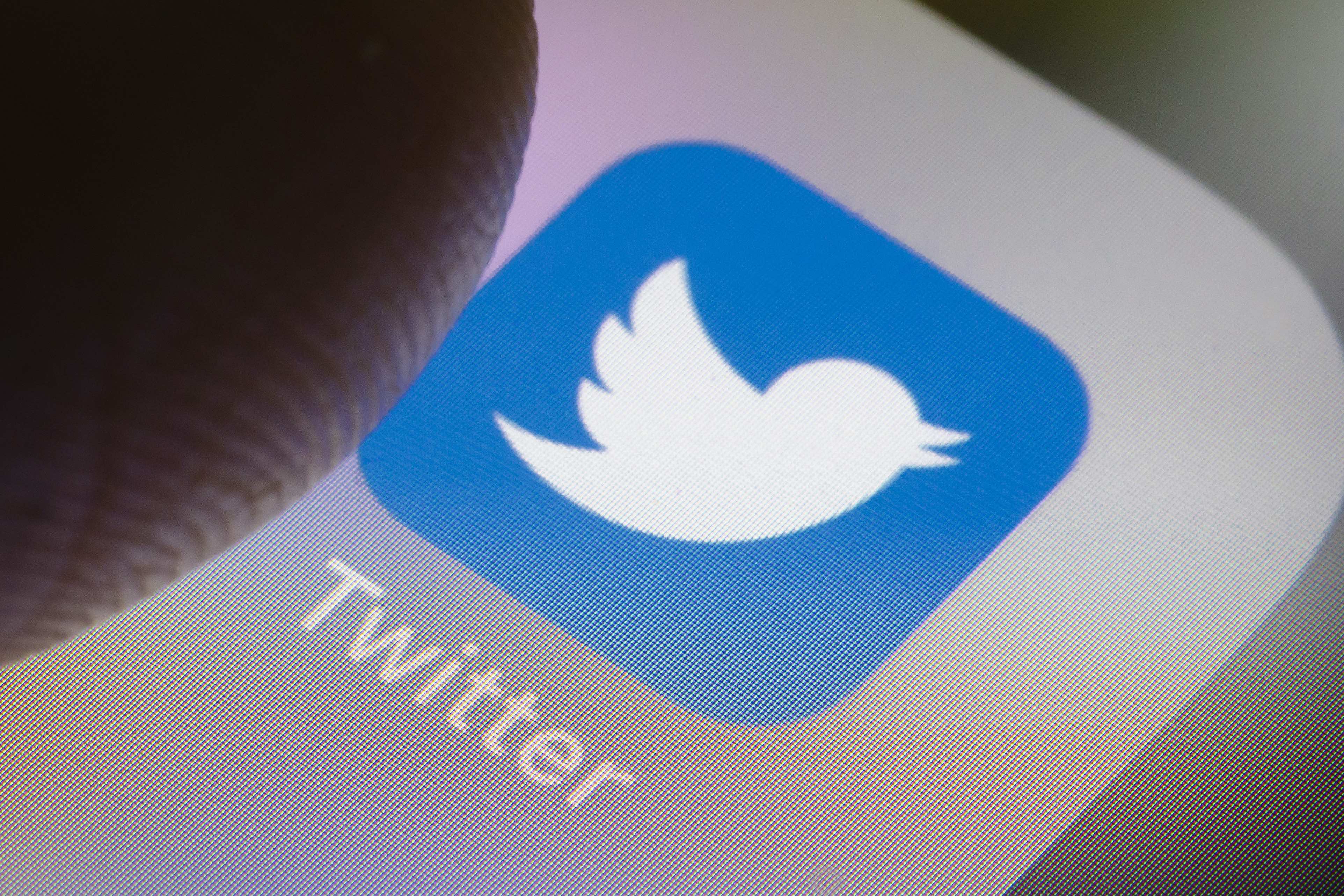 In this photo illustration the Twitter app is displayed on a smartphone. (Thomas Trutschel/Photothek via Getty Images)