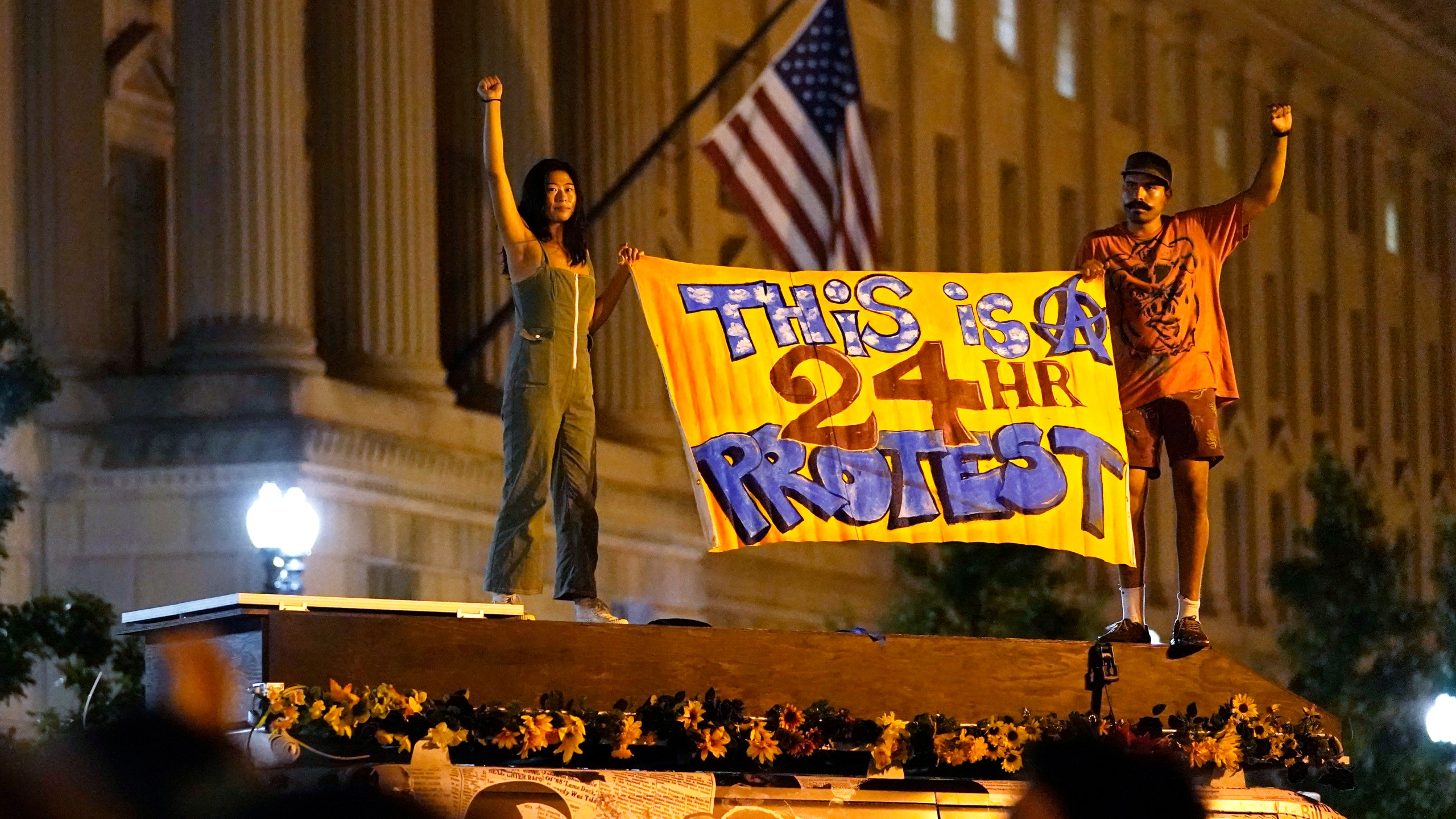 Protestors rally on Aug. 27, 2020, in Washington, D.C. President Donald Trump is set to deliver his acceptance speech later Thursday night from the nearby White House South Lawn. (AP Photo/Carolyn Kaster)