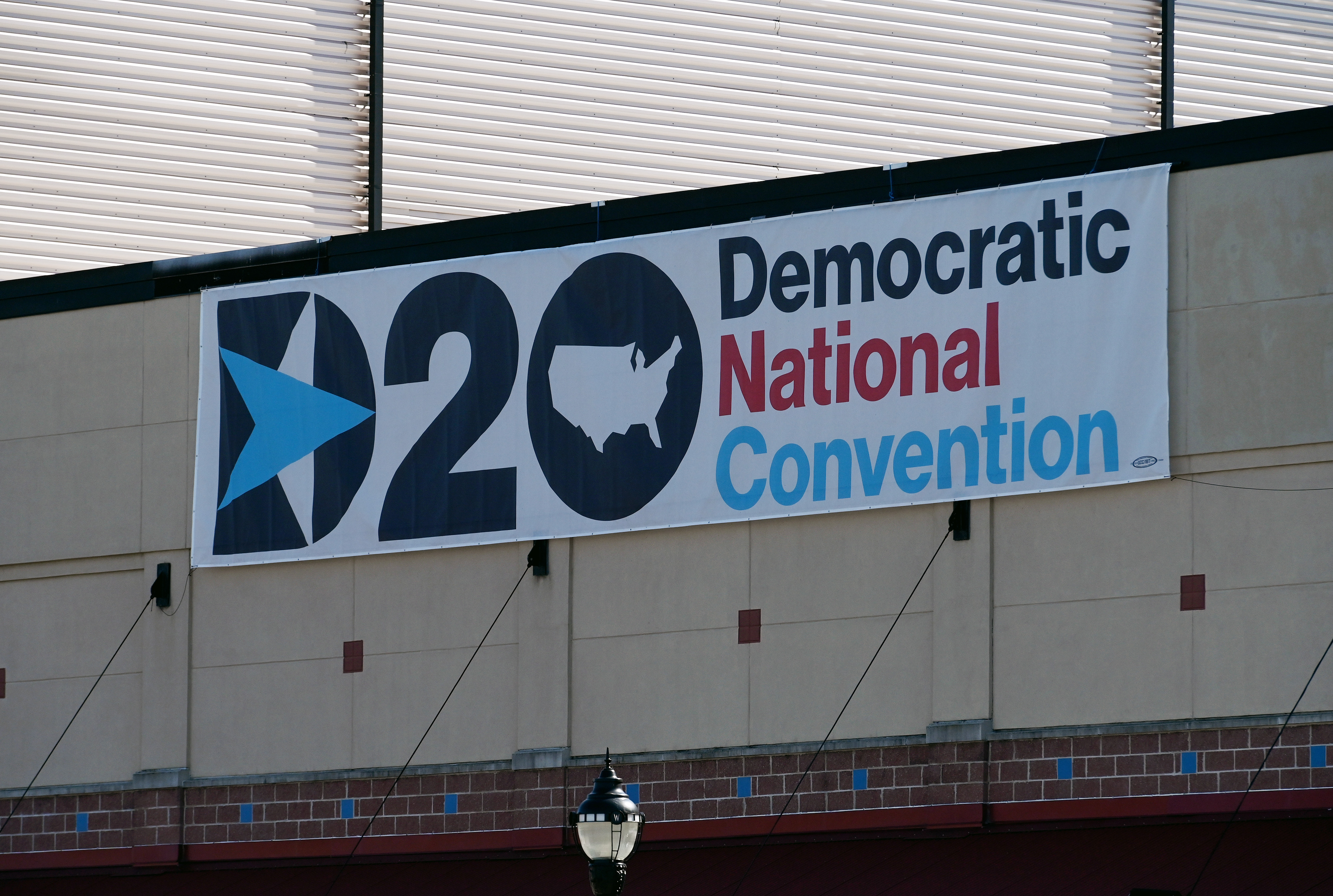 A banner is seen on the second day of the Democratic National Convention at the Chase Center in Wilmington, Delaware on Aug. 18, 2020. (OLIVIER DOULIERY/AFP via Getty Images)