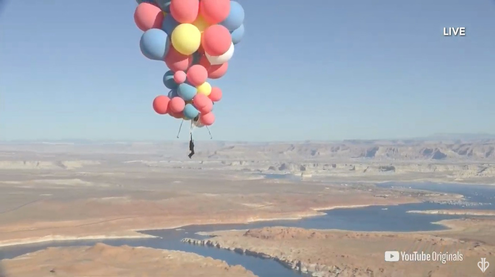 David Blaine just managed to do what so many can only dream of -- flying up into the air using a bunch of balloons. (From David Blaine/Youtube via CNN Wire)