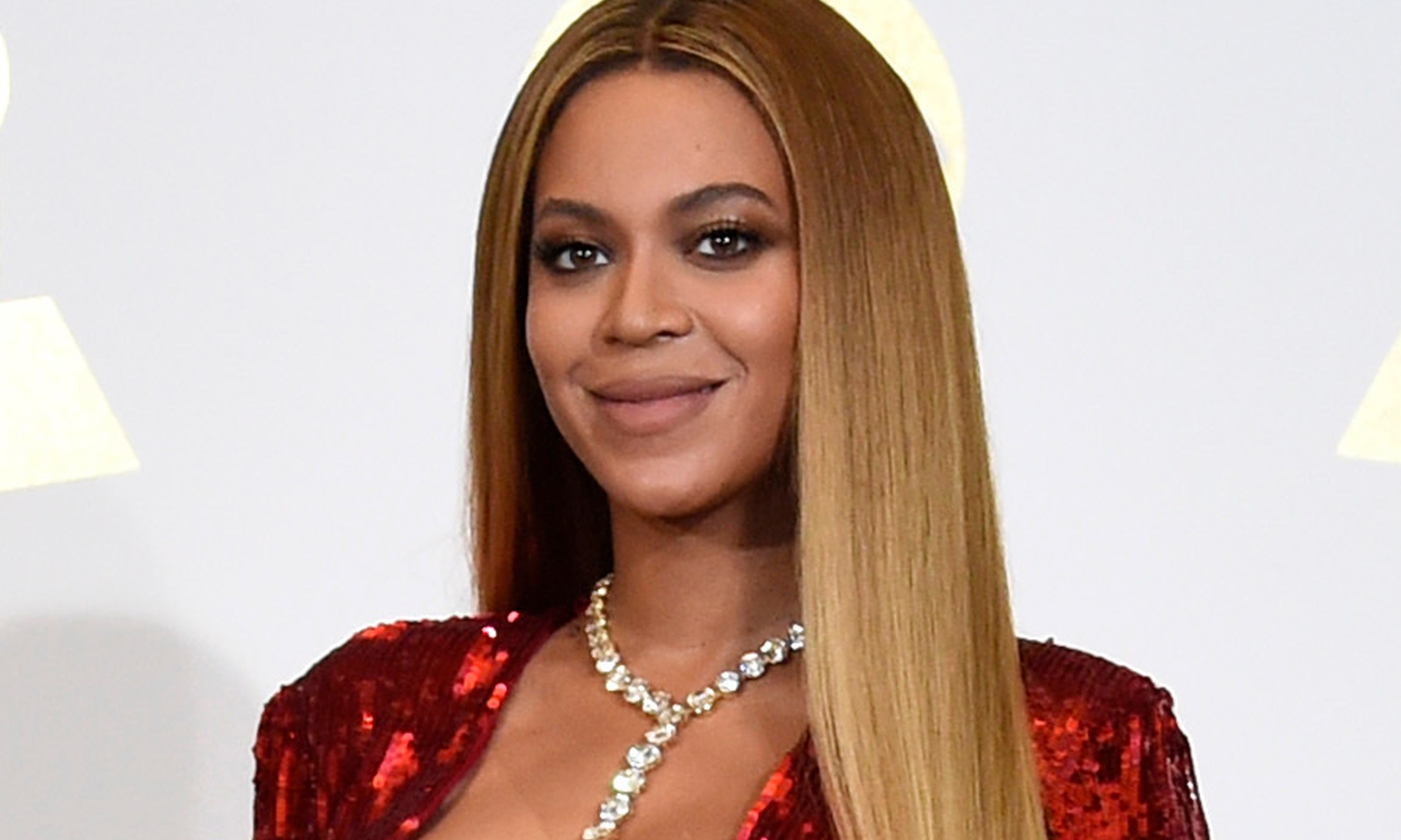 In this Feb. 12, 2017 file photo, Beyonce poses in the press room at the 59th annual Grammy Awards in Los Angeles. The pop star scored multiple Grammy nominations Tuesday, making her the leading contender with nine nominations. (Photo by Chris Pizzello/Invision/AP, File)