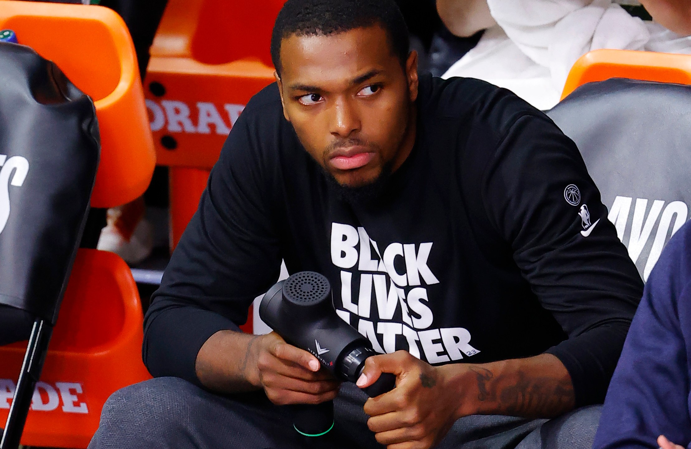 Sterling Brown of the Milwaukee Bucks holds the Hyperice Hypervolt during Game 5 of the Eastern Conference against the Orlando Magic during the 2020 NBA Playoffs at AdventHealth Arena at ESPN Wide World Of Sports Complex on Aug. 29, 2020 in Lake Buena Vista, Florida. (Kevin C. Cox/Getty Images)