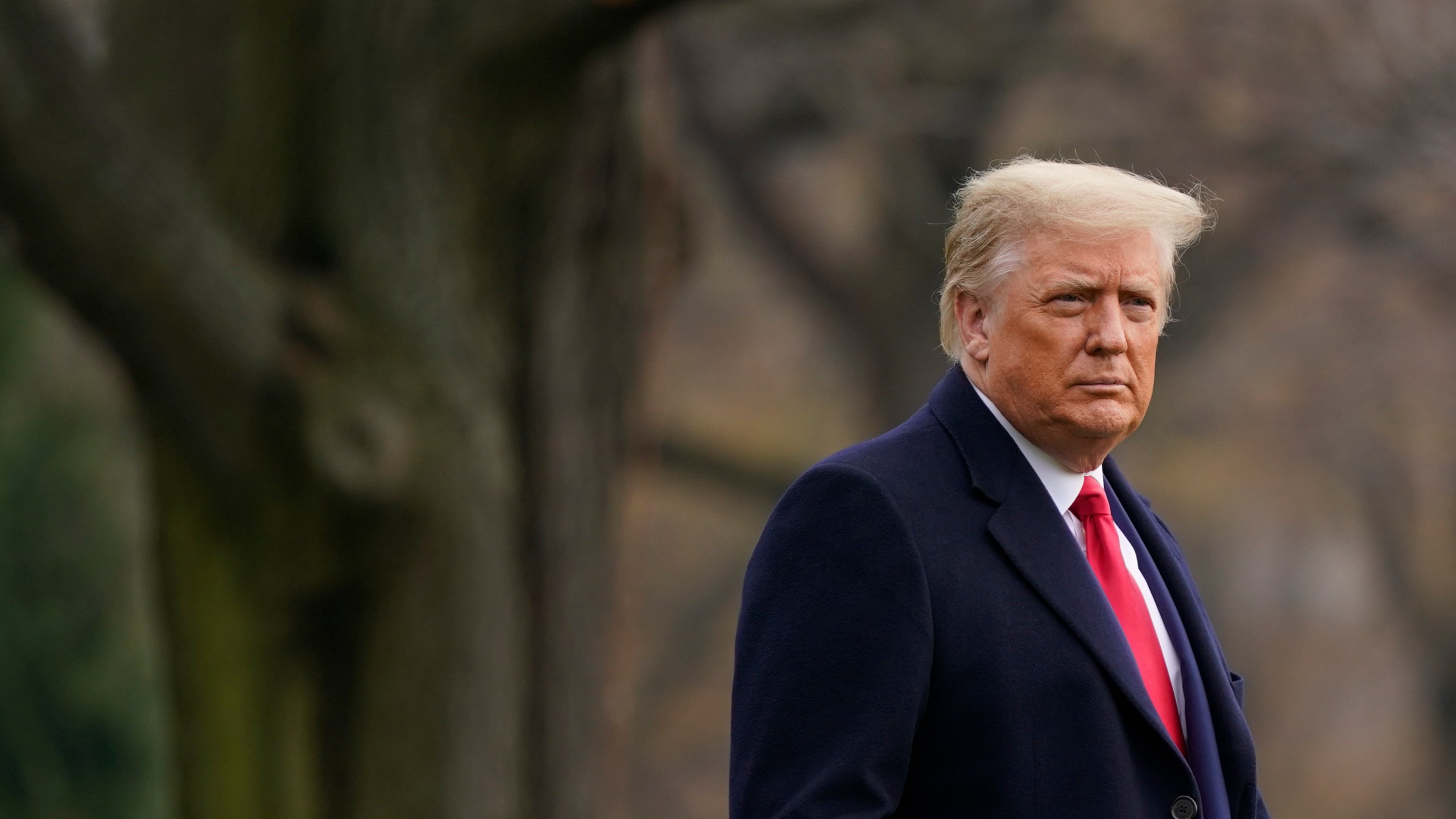 In this Dec. 12, 2020, photo, President Donald Trump walks on the South Lawn of the White House in Washington before boarding Marine One. (AP Photo/Patrick Semansky, File)