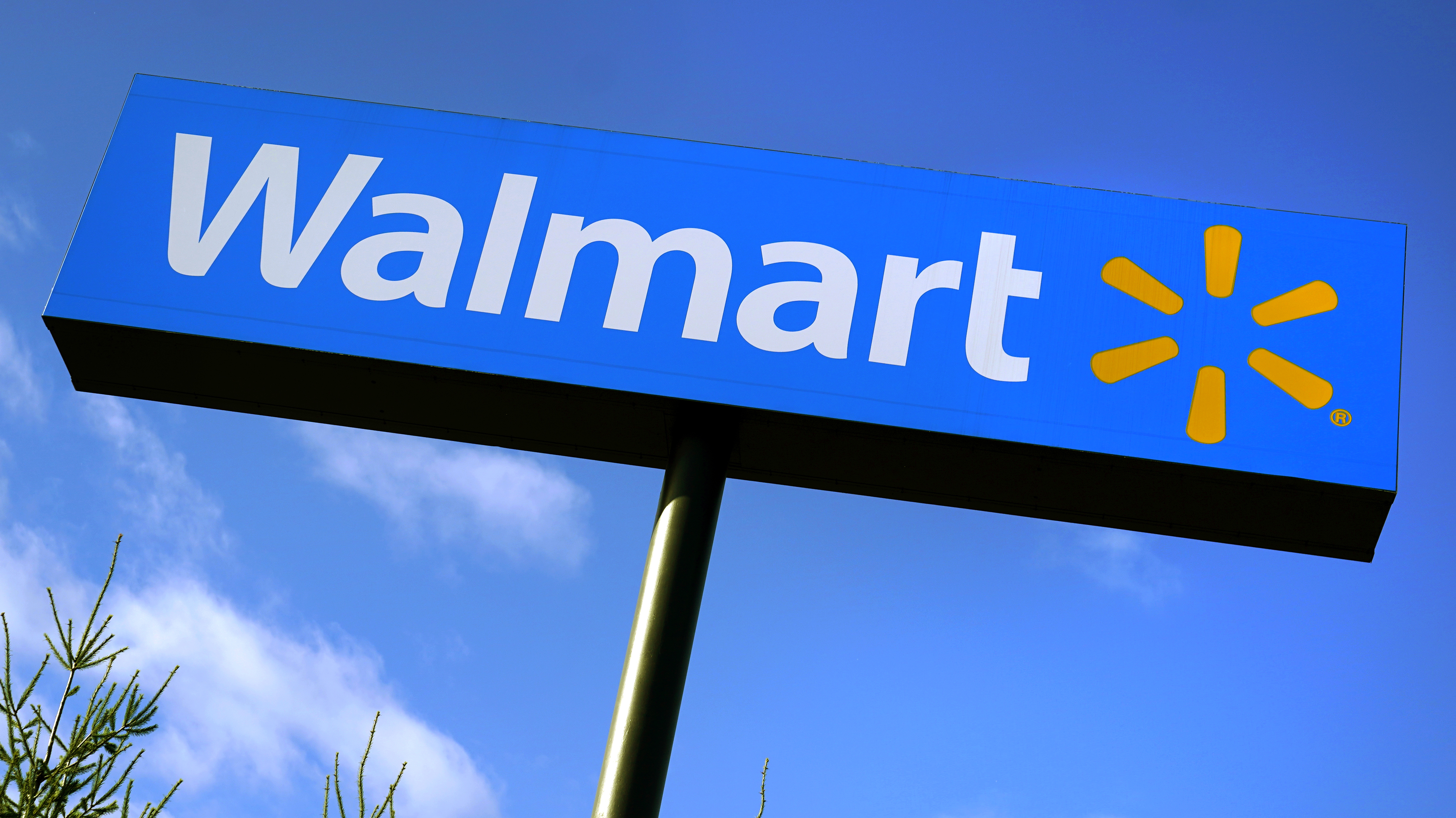 A Walmart store sign is visible from Route 28, Wednesday, Nov. 18, 2020, in Derry, N.H. (AP Photo/Charles Krupa)