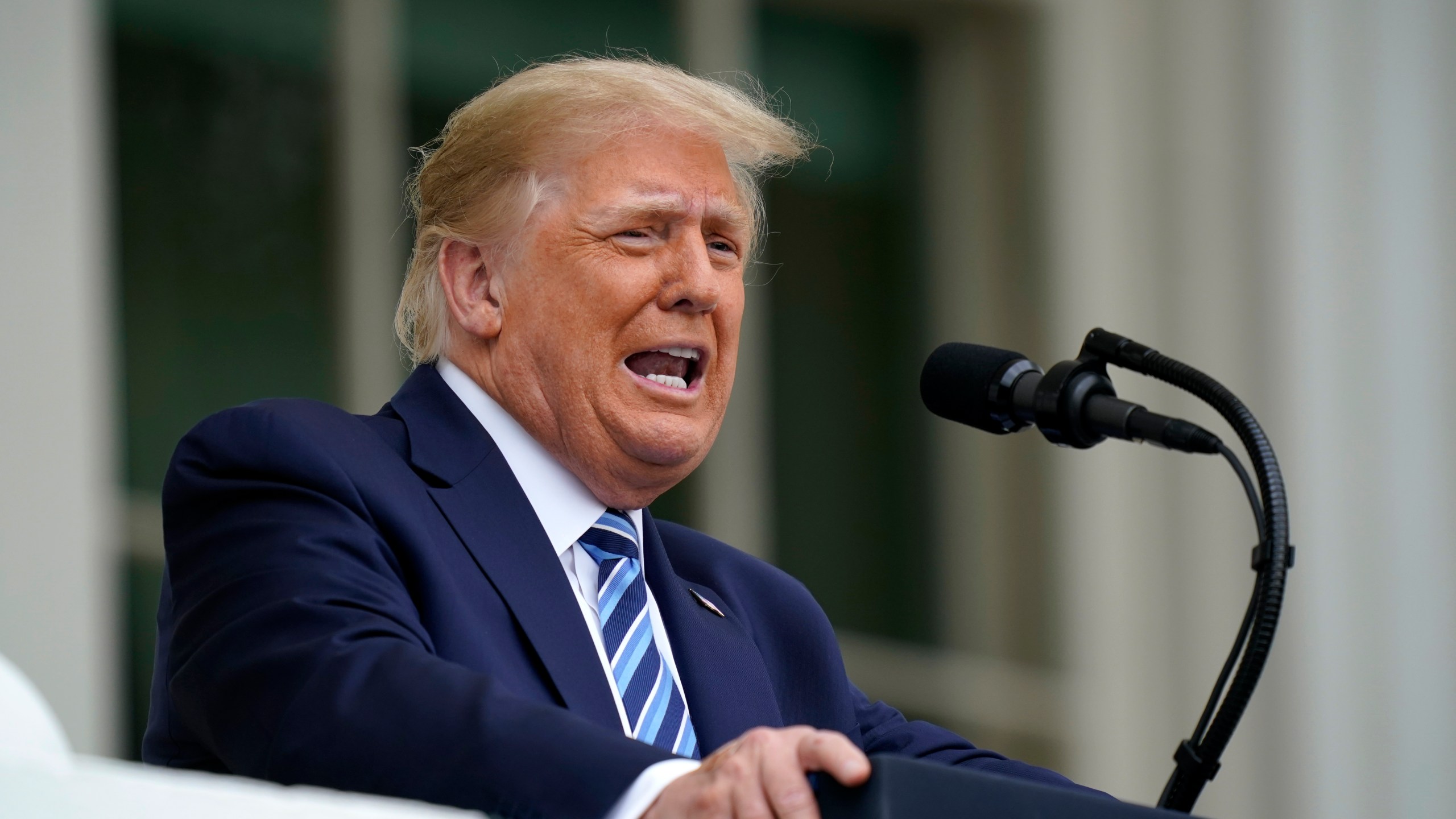 In this Oct. 10, 2020, file photo, President Donald Trump speaks from the Blue Room Balcony of the White House to a crowd of supporters in Washington. (Alex Brandon/Associated Press)