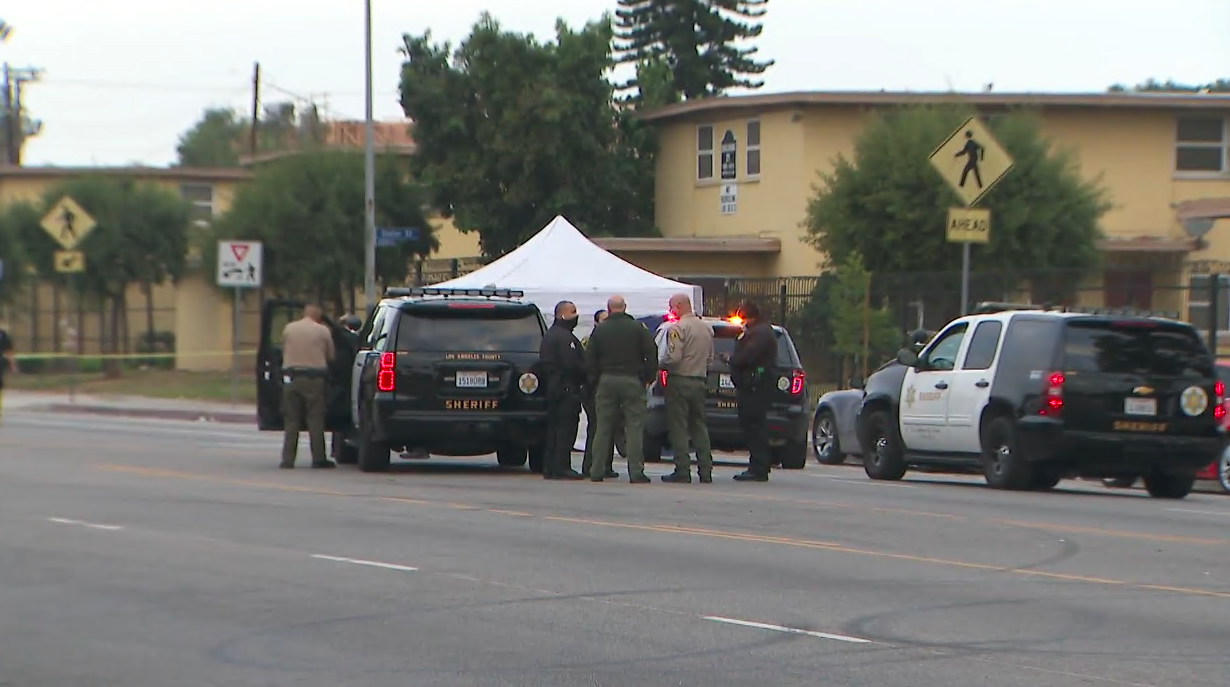 L.A. County sheriff's deputies investigate a deadly crashing involving an officer on Imperial Highway on Dec. 11, 2020. (KTLA)