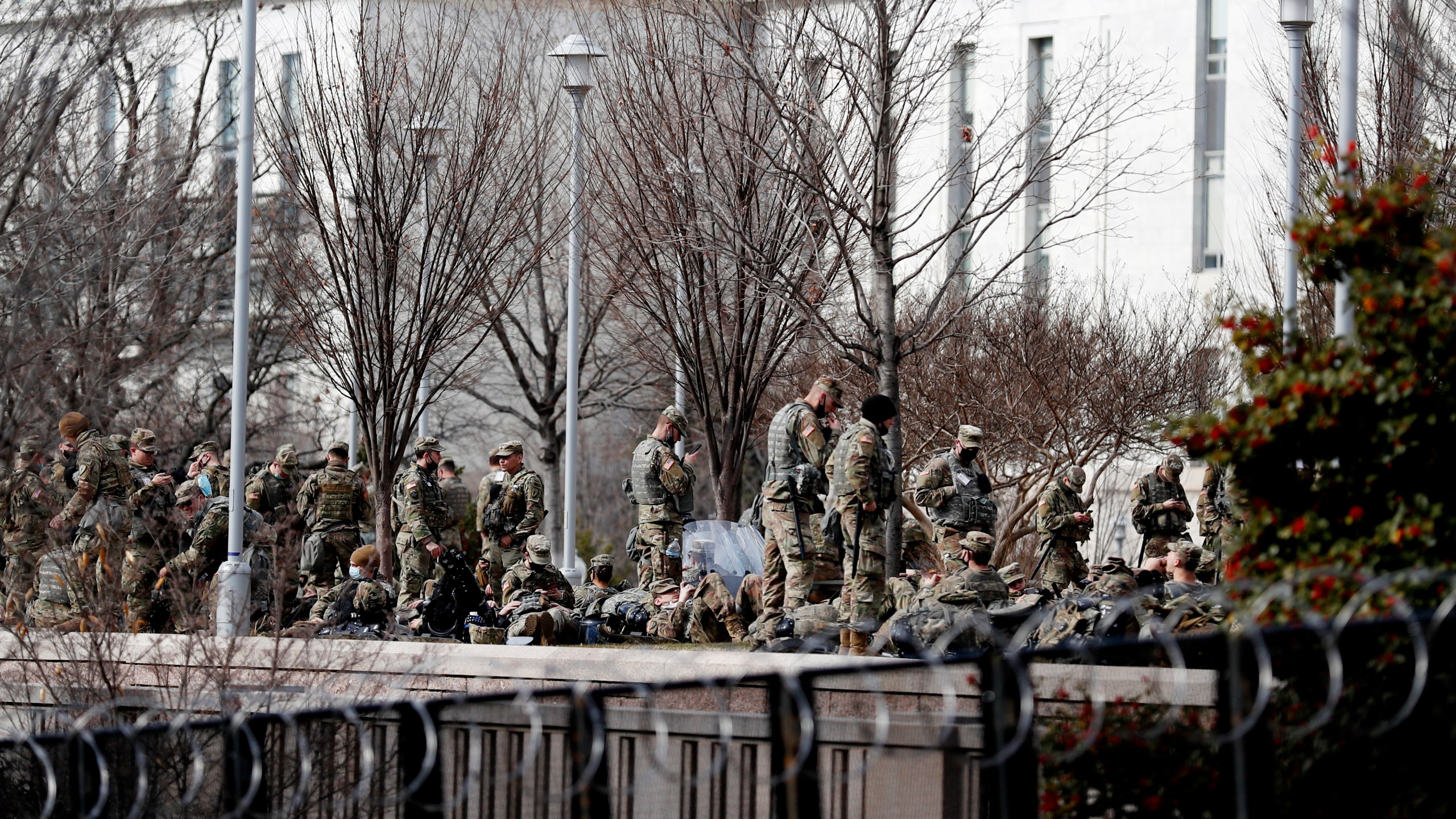 Images of National Guard soldiers camped in a cold parking garage after being sent to protect Washington sparked new calls Friday for investigations of the U.S. Capitol Police, now facing allegations that the agency evicted troops sent to help after its failure to stop rioting mobs two weeks ago. Members of both parties were irate about reports that Guardsmen were forced to take rest breaks outside the Capitol building. About 25,000 Guard members from across the country deployed to help secure President Joe Biden's inauguration, which went off with only a handful of minor arrests. A jittery Washington requested the aid following the riot where police were badly outnumbered, locking down the nation's capital with soldiers, police and barricades and lawmakers and Biden took pains to thank security forces for their effort. All 25,000 Guard members were vetted by the FBI over concerns of an insider attack, and a dozen were removed from their posts including two who made extremist statements about the inauguration. The National Guard said it originally moved troops out of the Capitol Rotunda and other spaces to garages at the behest of the Capitol Police. The Guardsmen were allowed back inside late Thursday after reports were widely shared of the conditions in the garages, with few bathrooms and little covering from the cold. Capitol Police Interim Chief Yogananda Pittman issued a statement Friday saying her agency “did not instruct the National Guard to vacate the Capitol Building facilities.” But two Capitol Police officers who spoke on condition of anonymity contradicted her statement, saying they were told department higher-ups had ordered the Guardsmen out. It was unclear why. The two officers spoke on condition of anonymity because they were not authorized by the department to speak. Sen. Jim Inhofe, R-Okla., said that “multiple members of military leadership” had told him a uniformed Capitol Police officer told them to leave the Capitol Visitor Center. “The troops didn't move on their own,” said Inhofe, the top Republican on the Senate Armed Services Committee. He added: “This isn’t a blame game, but I want to know what happened so we can make sure it can’t happen again.” Rep. Tim Ryan, D-Ohio, who leads a subcommittee that oversees the Capitol Police budget, said Pittman and other commanders would eventually need to testify about their decision-making. “If the Capitol Police in any way, shape, or form pushed the Guard out into a cold garage, then there’s going to be hell to pay,” Ryan said . “We’re already trying to re-establish trust with the Capitol Police and we’ve got to figure out exactly what happened.” The National Guard Bureau said Thursday that of the nearly 26,000 Guard troops deployed to D.C. for the inaugural, just 10,600 remain on duty. The bureau said the Guard is helping states with coordination and the logistics so that troops can get home. Thousands of Guard troops from all across the country poured into D.C. by the planeload and busload late last week, in response to escalating security threats and fears of more rioting. Military aircraft crowded the runways at Joint Base Andrews in Maryland, carrying Guard members into the region in the wake of the deadly Jan. 6 insurrection at the U.S. Capitol. Guard forces were scattered around the city, helping to secure the Capitol, monuments, Metro entrances and the perimeter of central D.C., which was largely locked down for several days leading up to Wednesday’s inaugural ceremony. Some local law enforcement agencies have asked for continued assistance from the Guard, so roughly 7,000 troops are expected to stay in the region through the end of the month. The insurrection highlighted multiple failures by the Capitol Police to prepare for what became a violent mob overrunning parts of the building. Officers who spoke to The Associated Press on condition of anonymity said there was little planning before the riot or guidance from department leaders once the riot began. The riot left five people dead, including Capitol Police Officer Brian Sicknick, who was hit in the head by a fire extinguisher. Another officer died in an apparent suicide after the attack.