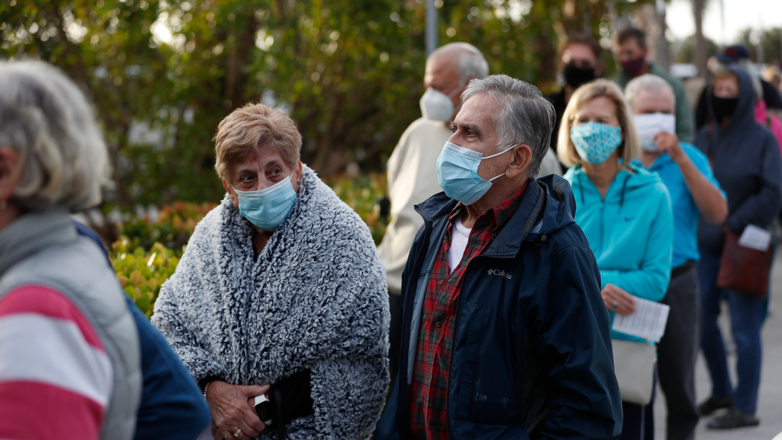 Seniors and first responders wait in line to receive a COVID-19 vaccine at the Lakes Regional Library on Dec. 30, 2020 in Fort Myers, Florida. (Octavio Jones/Getty Images)