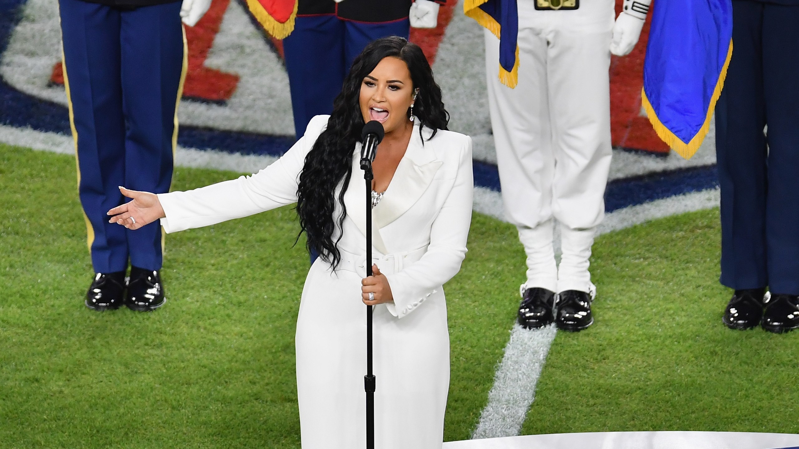 Demi Lovato sings the National Anthem during Super Bowl LIV between the Kansas City Chiefs and the San Francisco 49ers at Hard Rock Stadium in Miami Gardens, Florida, on Feb. 2, 2020. (ANGELA WEISS/AFP via Getty Images)