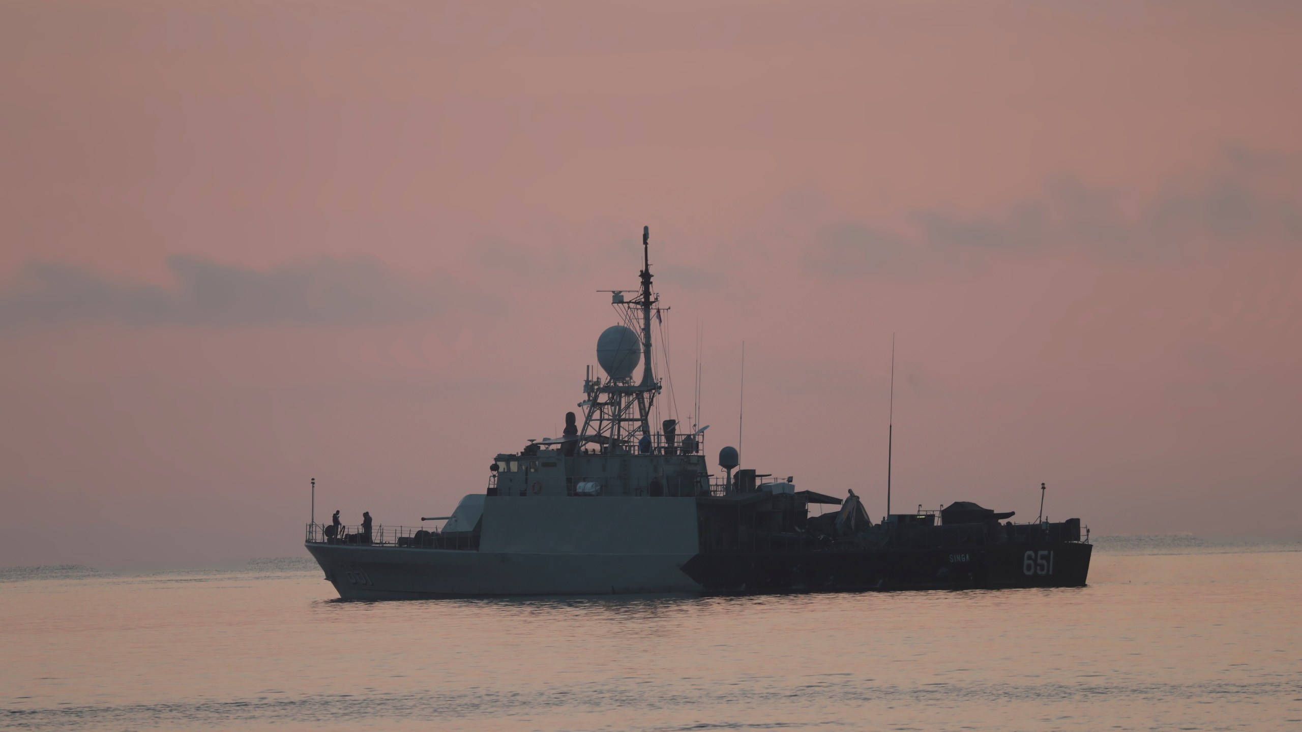 An Indonesian navy patrol ship sails to join the search for submarine KRI Nanggala that went missing while participating in a training exercise on Wednesday, off Banyuwangi, East Java, Indonesia Sunday, April 25, 2021. (AP Photo/Achmad Ibrahim)