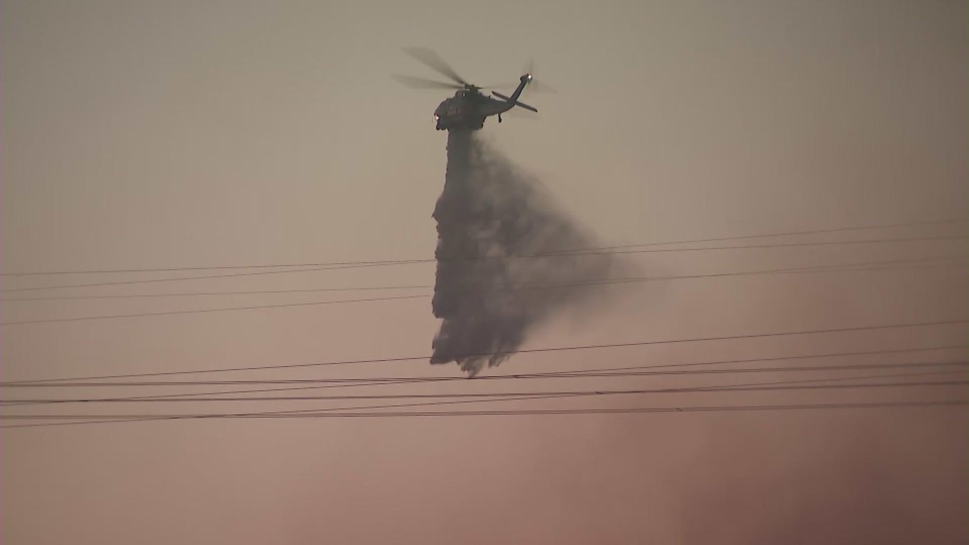 A drop is made on the North Fire burning in Castaic on April 28, 2021. (KTLA)