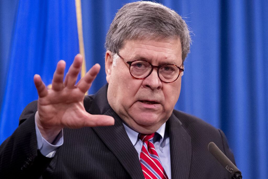 In this Dec. 21, 2020, file photo, Attorney General William Barr speaks during a news conference at the Justice Department in Washington. (Michael Reynolds/Pool via AP, File)