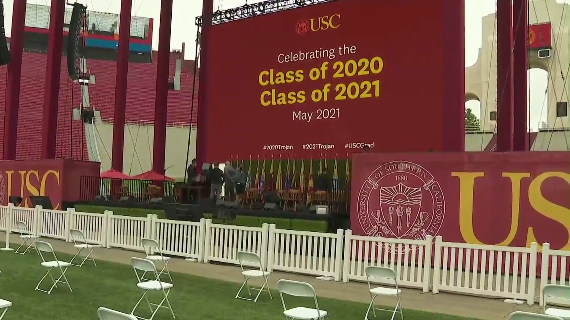 Preparations are made at the Los Angeles Memorial Coliseum for graduation ceremonies on May 14, 2021. (KTLA)