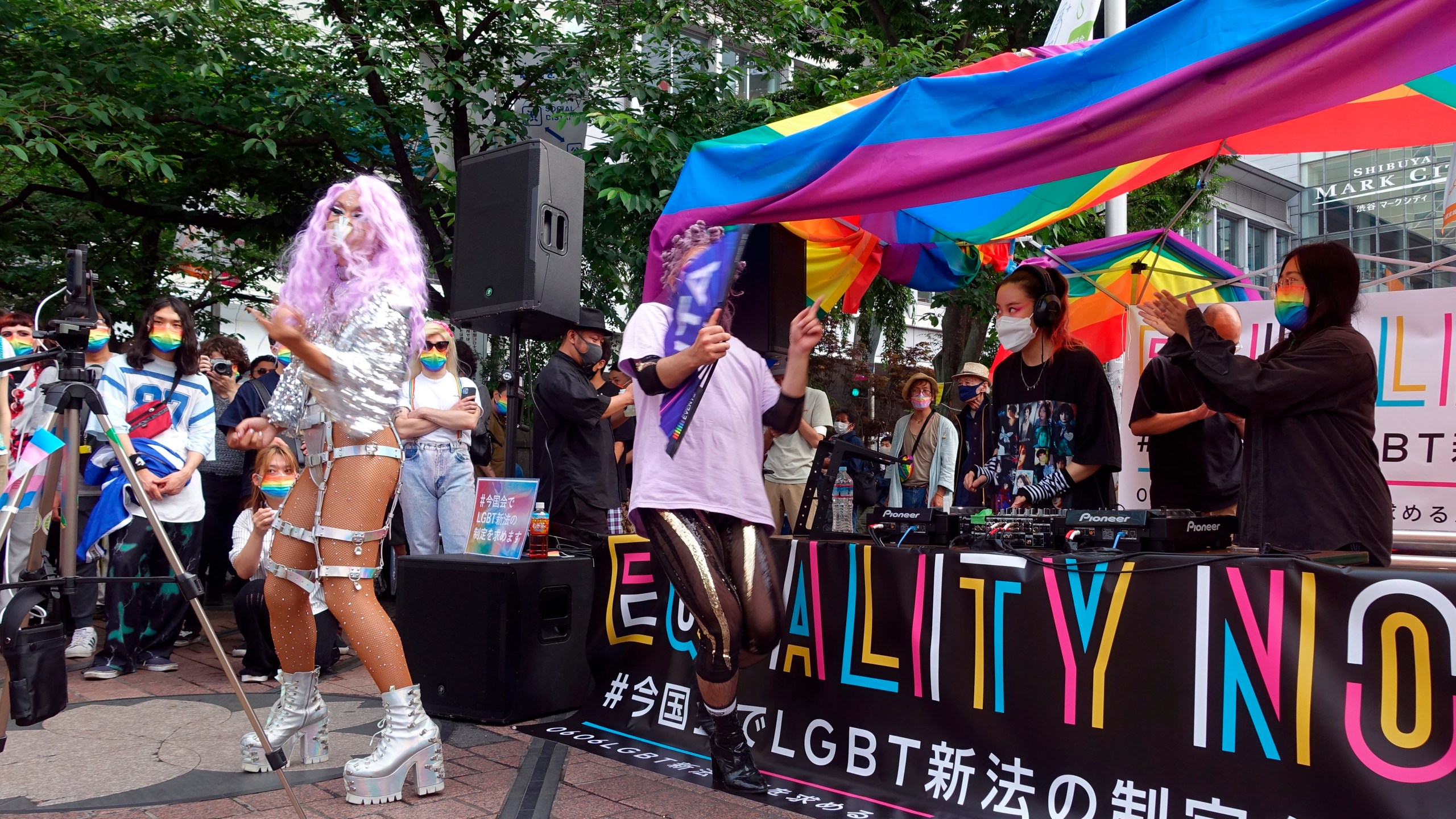 Dozens of LGBTQ activists and supporters of equal rights laws gather at the Shibuya district Sunday June 6, 2021, in Tokyo. (AP Photo/Mari Yamaguchi)