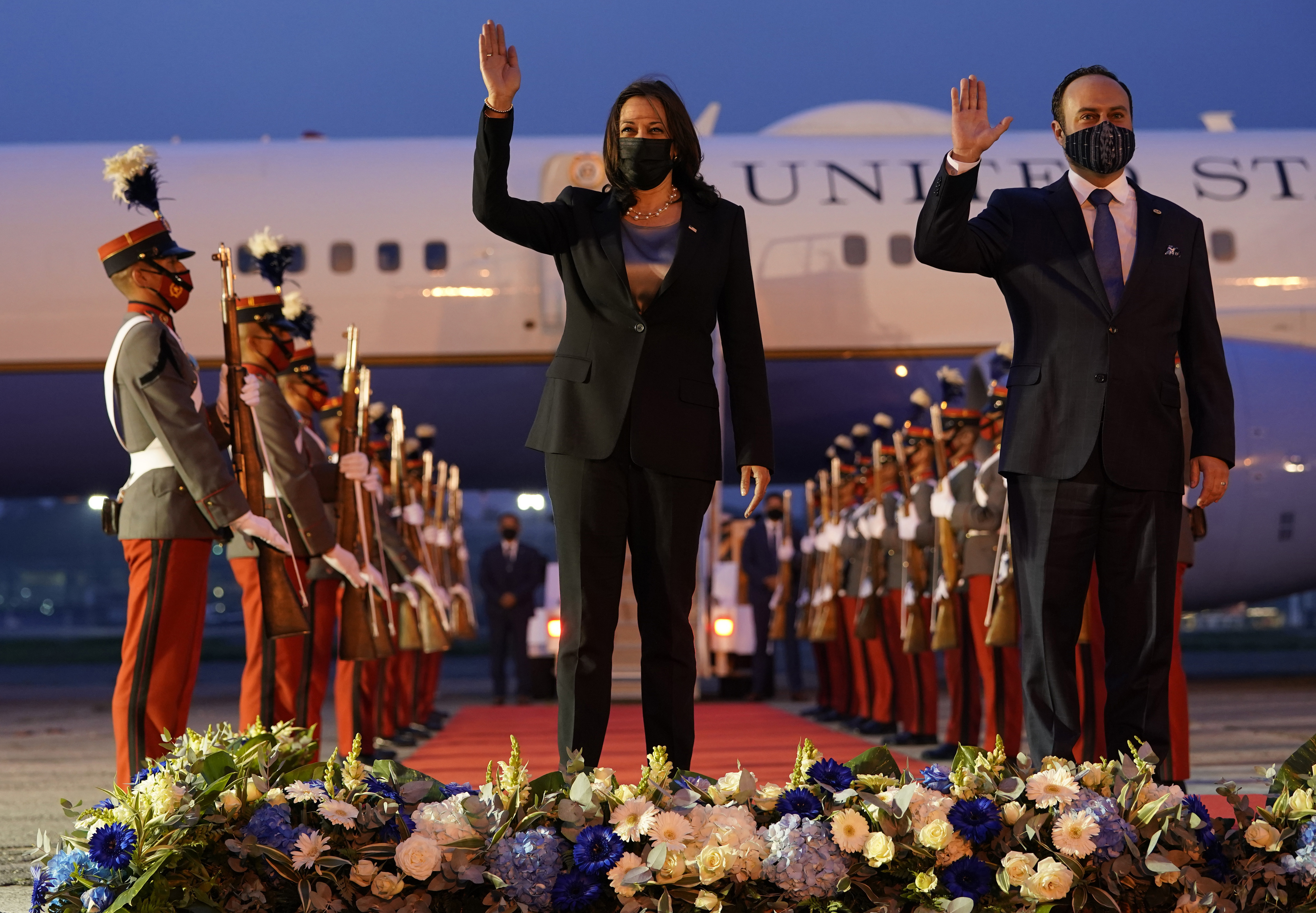 Vice President Kamala Harris and Guatemala's Minister of Foreign Affairs Pedro Brolo wave at her arrival cermony in Guatemala City, Sunday, June 6, 2021, at Guatemalan Air Force Central Command. (AP Photo/Jacquelyn Martin)