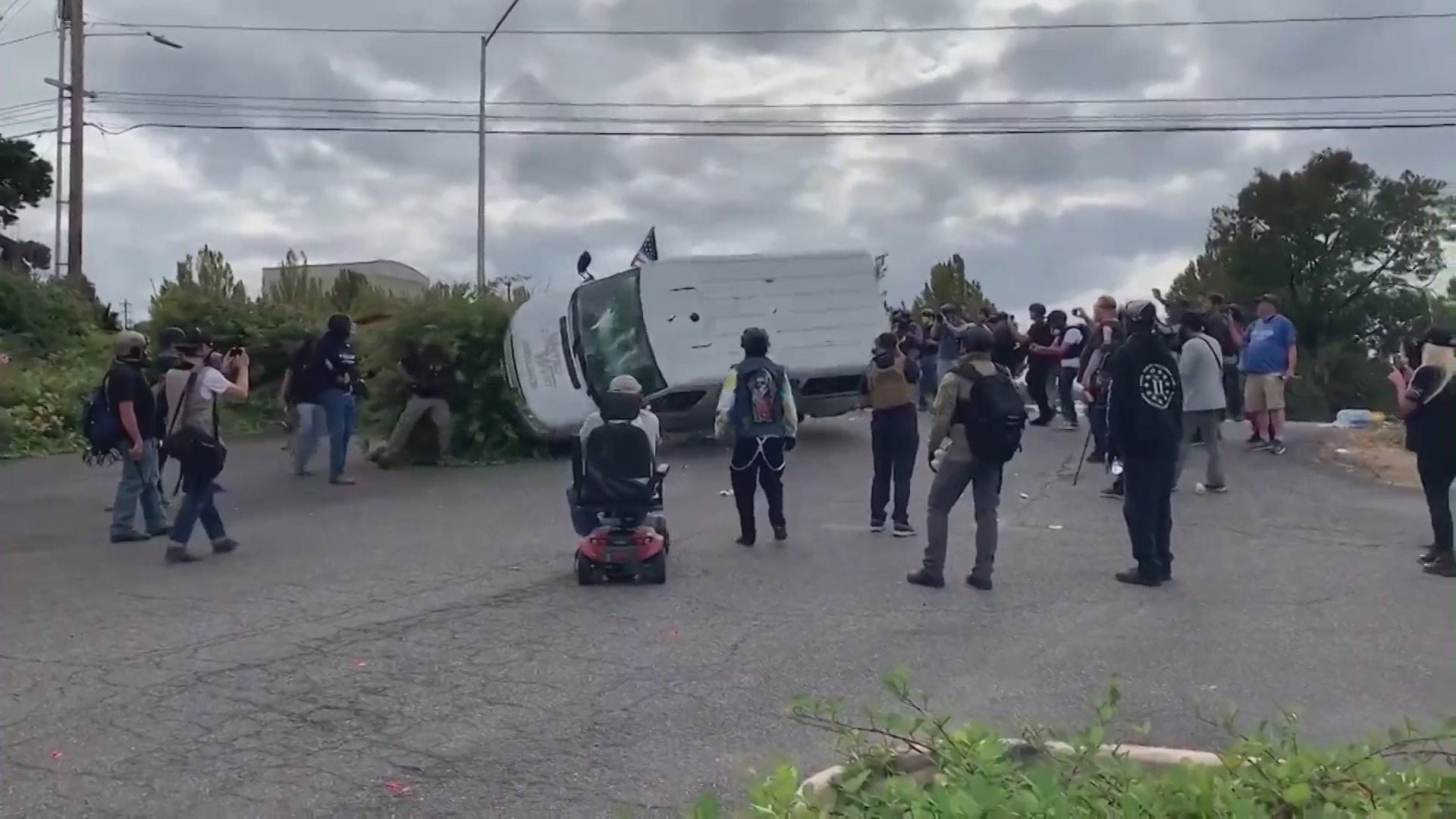 Protesters toppled a van in Portland on Aug. 22, 2021. (Sean Beckner-Carmitchell)