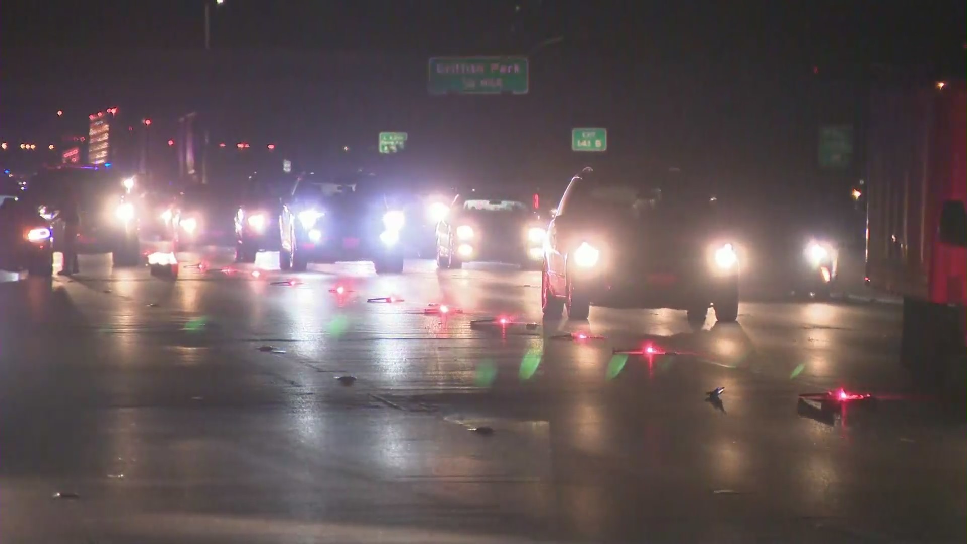 Cars drive past a fatal crash involving a pedestrian on the 5 Freeway in the Los Feliz area on Aug. 18, 2021. (KTLA)