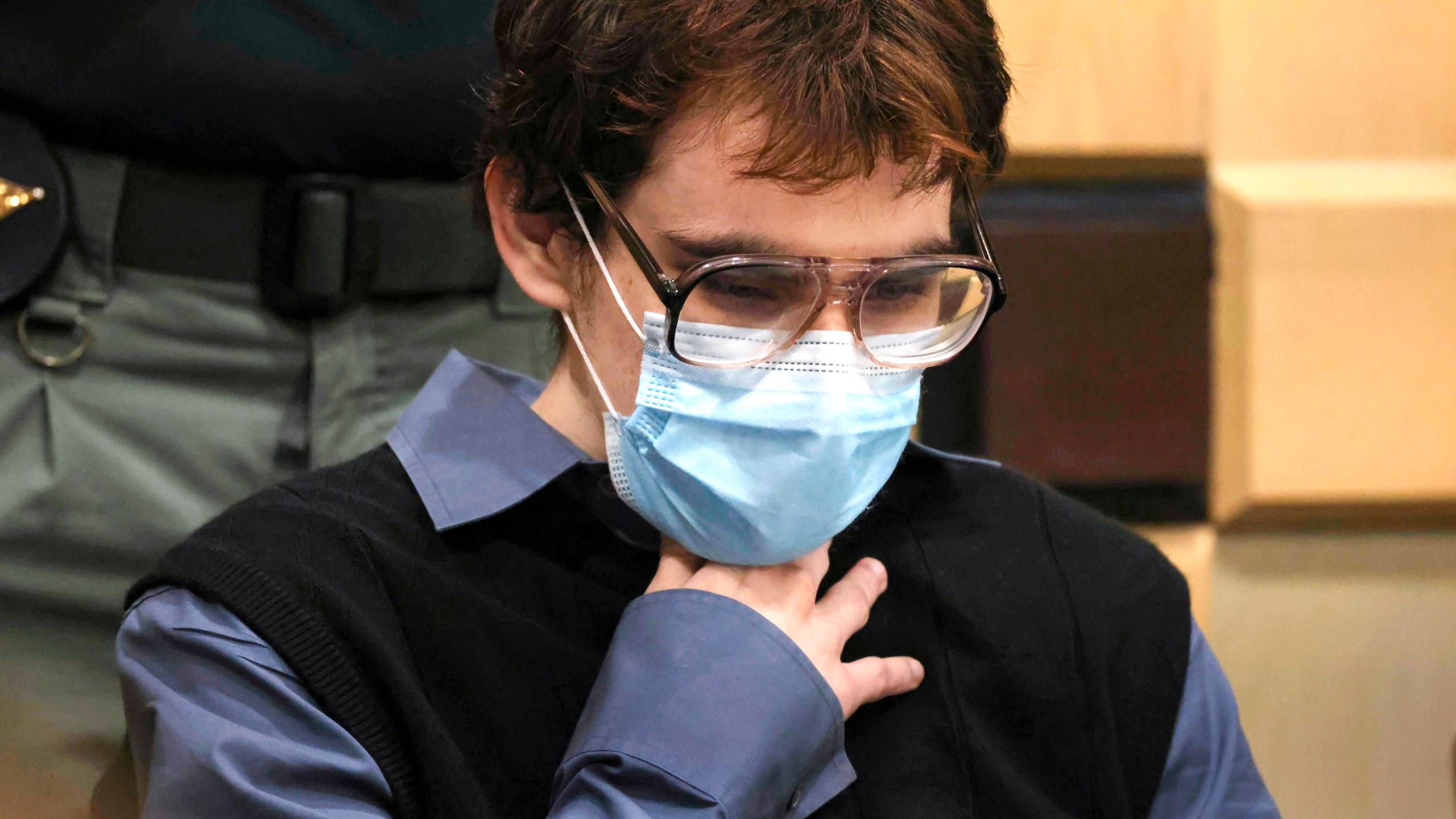 Parkland school shooter Nikolas Cruz sits at the defense table, Wednesday, Oct. 20, 2021, at the Broward County Courthouse in Fort Lauderdale, Fla. Cruz pleaded guilty Wednesday to murder in the 2018 high school massacre in Parkland, Fla.,, that left 17 dead. (Amy Beth Bennett/South Florida Sun Sentinel via AP, Pool)