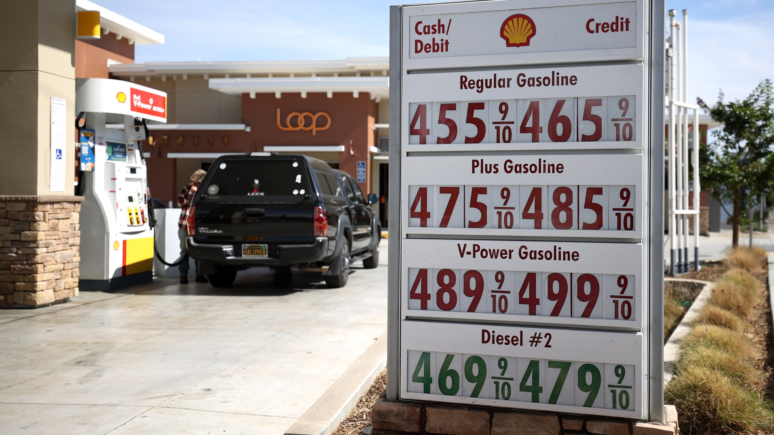 Gas prices approaching $5 a gallon are displayed in front of a Shell gas station on Oct. 5, 2021, in San Rafael. (Justin Sullivan/Getty Images)