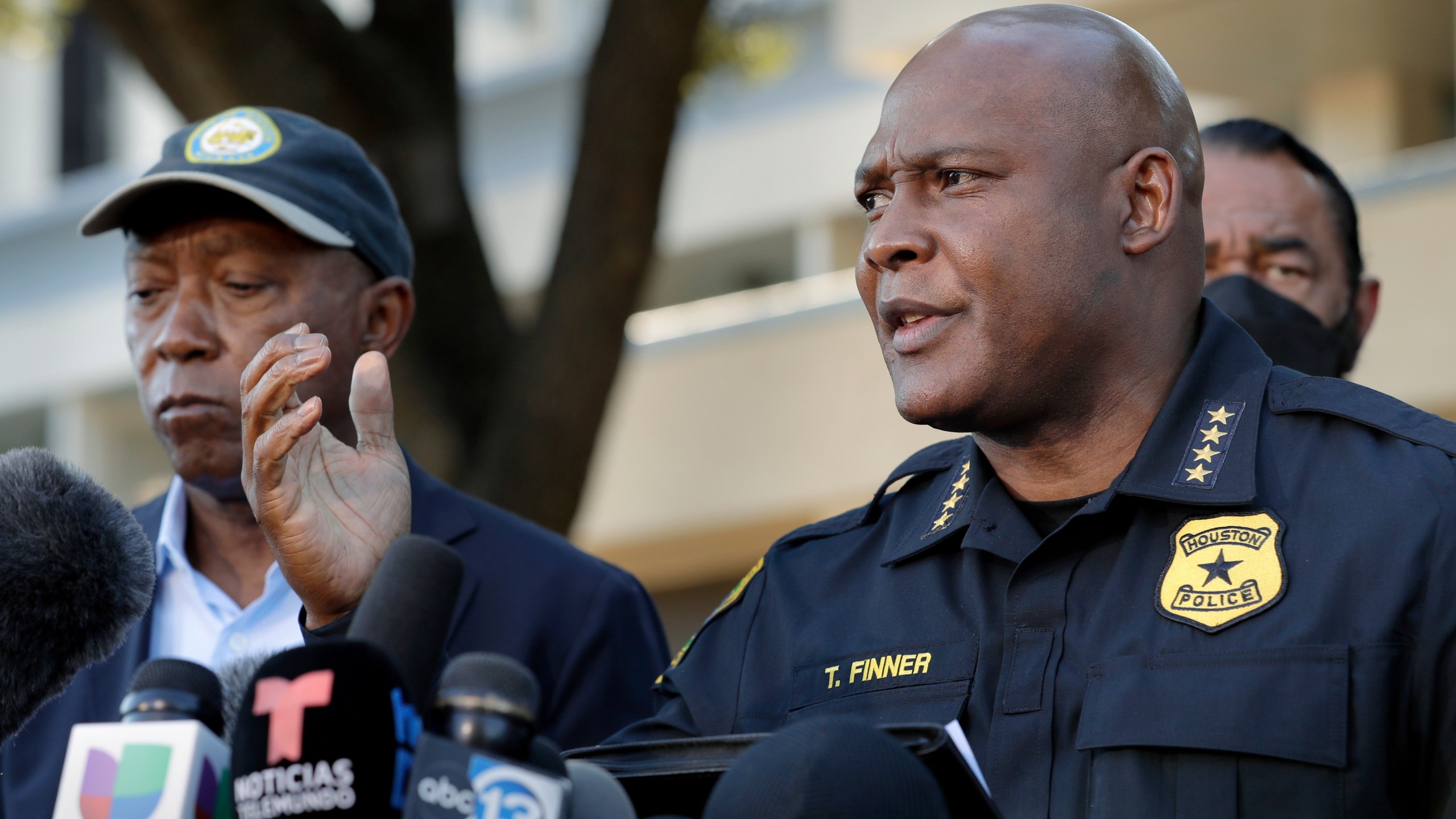 Houston Police Chief Troy Finner, right, speaks next to Mayor Sylvester Turner, left, during a news conference in Houston on Nov. 6, 2021 after several people died and scores were injured during a music festival the night before. (Michael Wyke/Associated Press)