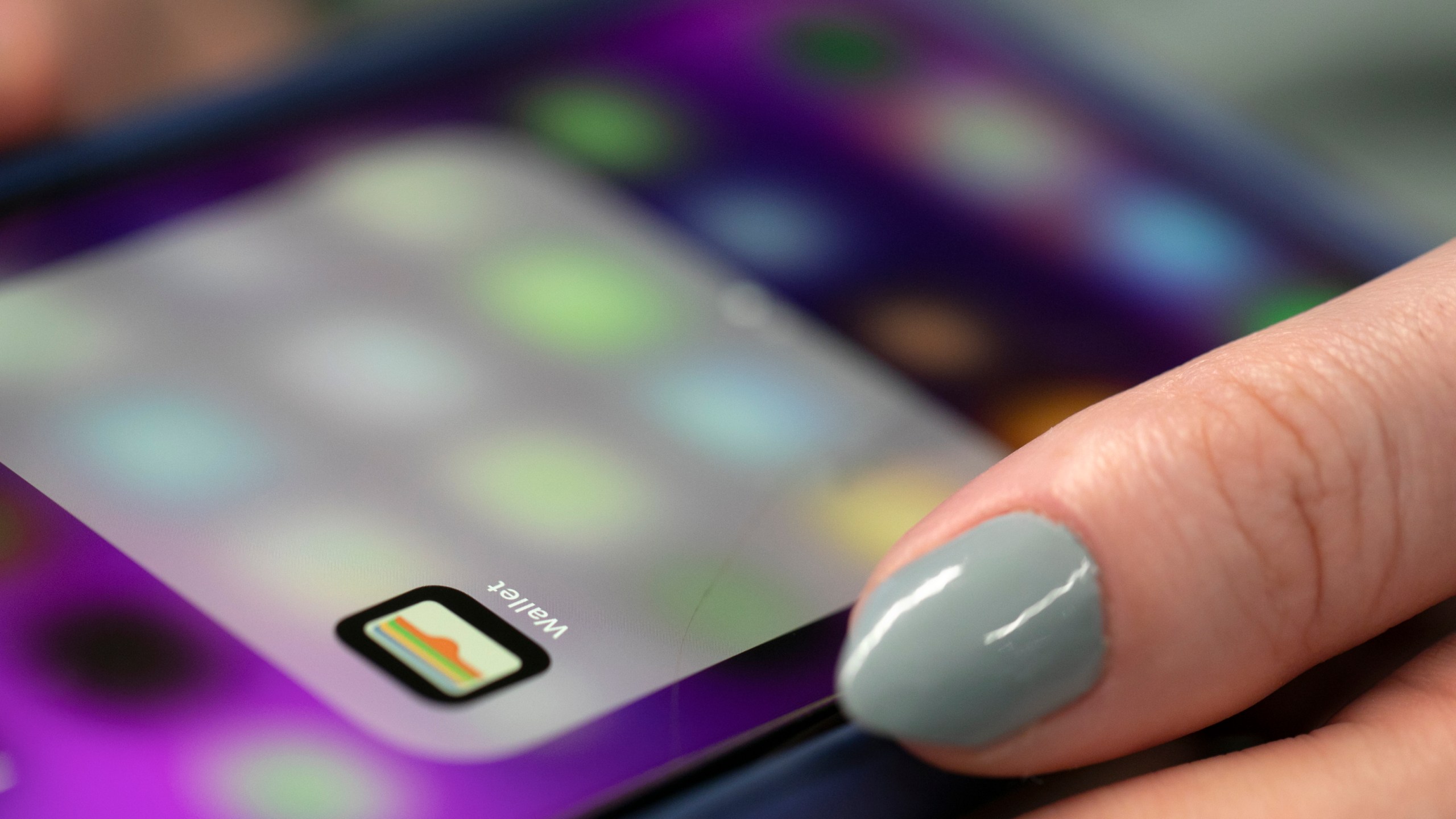A person uses an iPhone on Oct. 8, 2019, in New York. (AP Photo/Jenny Kane, File)