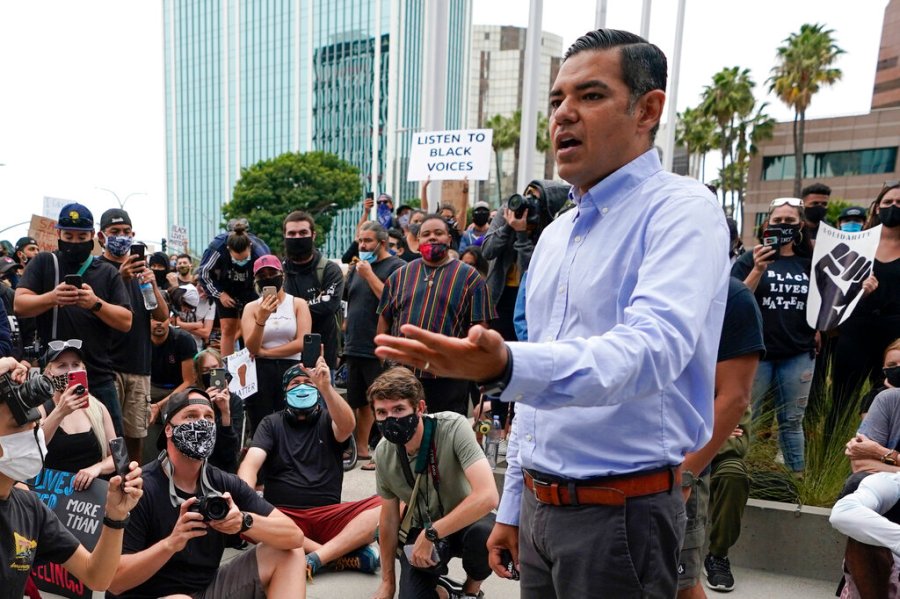 Robert Garcia, the mayor of Long Beach, Calif., speaks to demonstrators outside Long Beach City Hall on June 4, 2020, in Long Beach, Calif. (AP Photo/Ashley Landis, File)