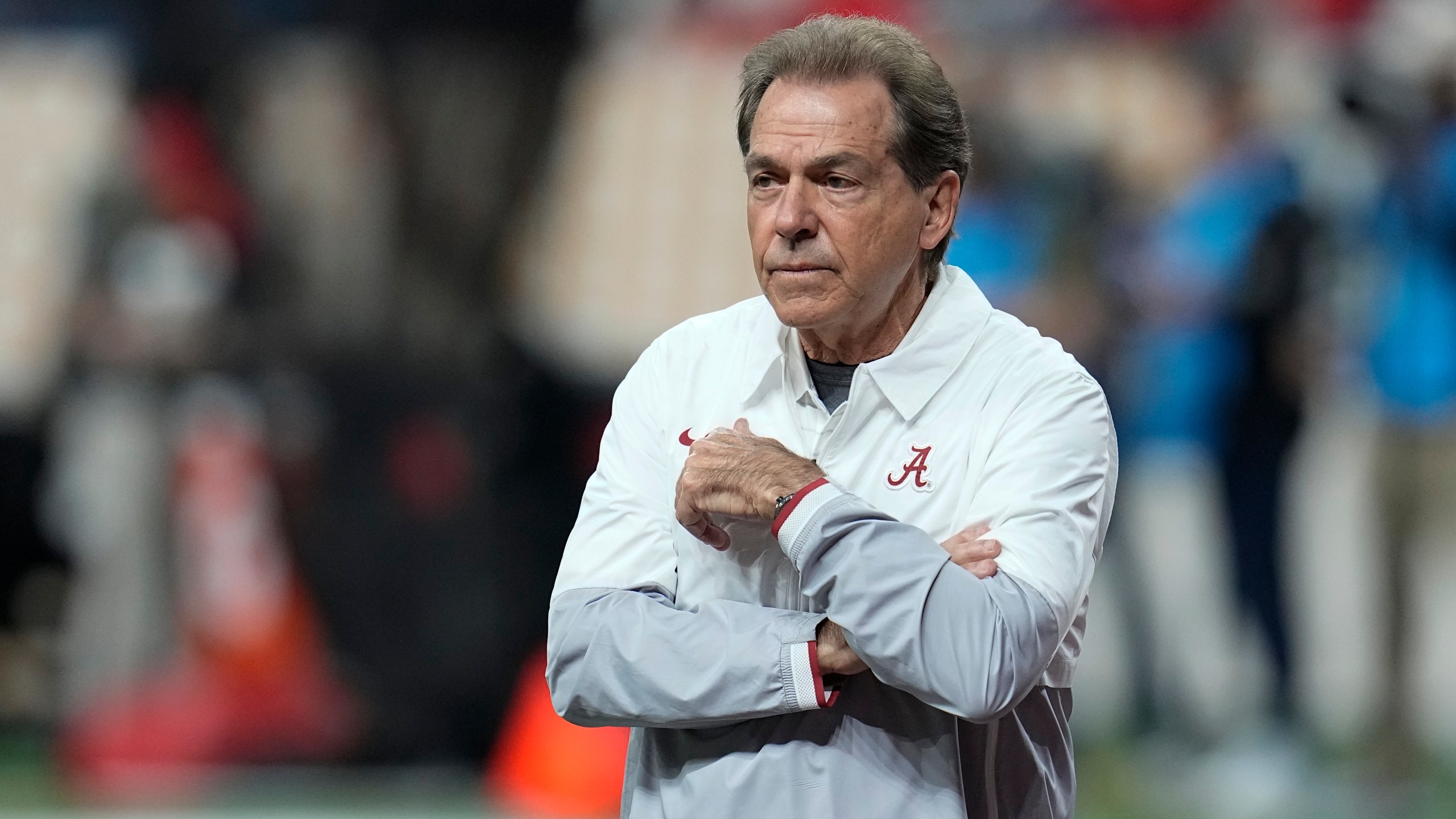Alabama head coach Nick Saban watches warm ups before the College Football Playoff championship football game against Georgia Monday, Jan. 10, 2022, in Indianapolis. (AP Photo/Paul Sancya)